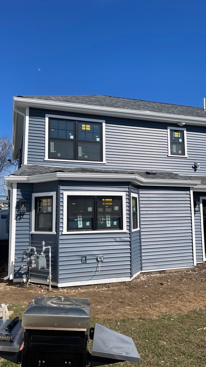 Full House Installation 5" white seamless gutters 2x3 leaders by Above All Gutters