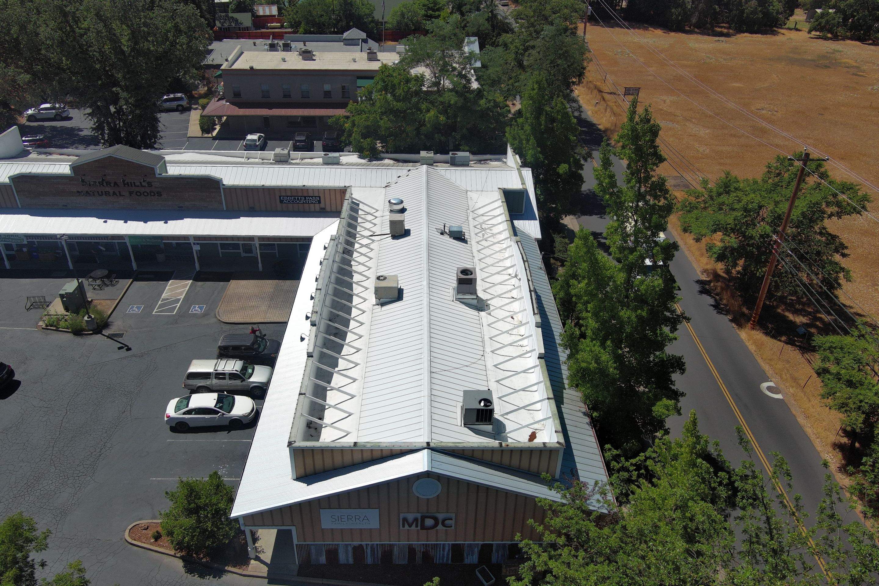 Foam Refurbish using Conklin Benchmark/PUMA XL coatings and spray foam by Straight Edge Roofing Inc