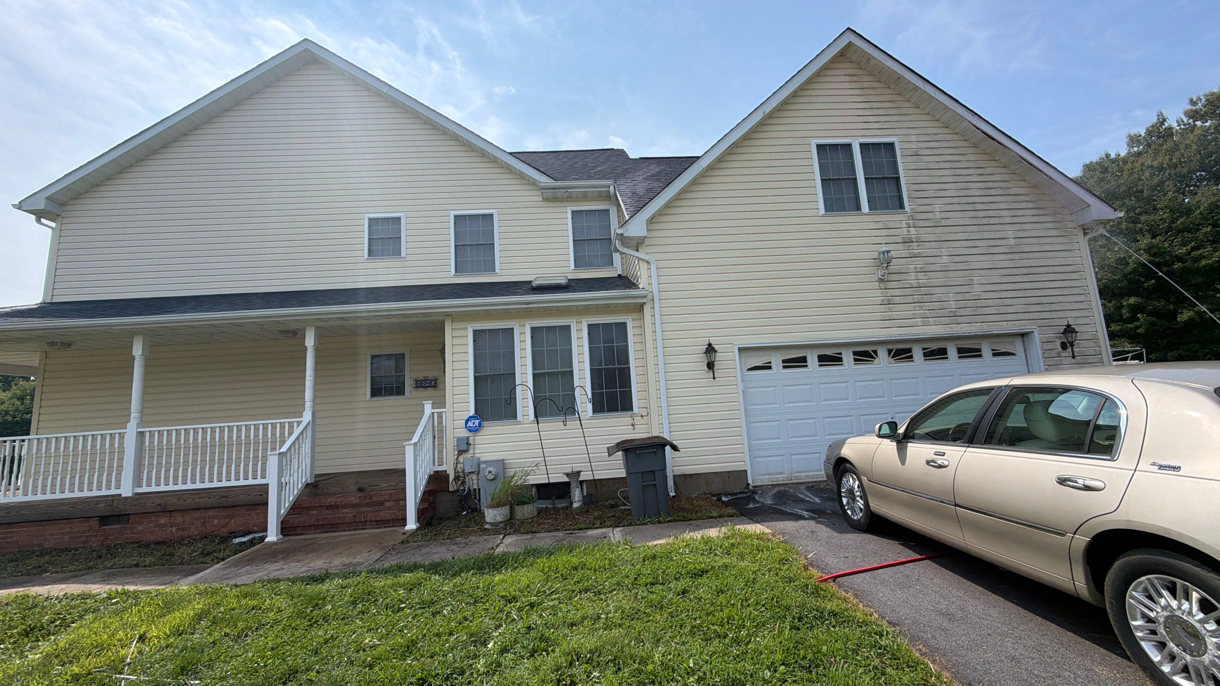 Vinyl Siding House Washing and Wood Deck Restoration in Carroll County by Baltimore Pressure Washers Inc.