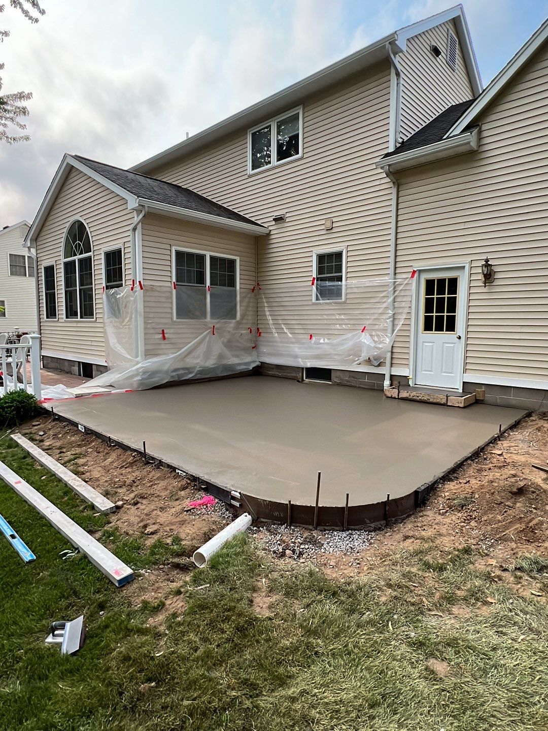 Broom finished concrete patio  by NG Masonry & Construction LLC
