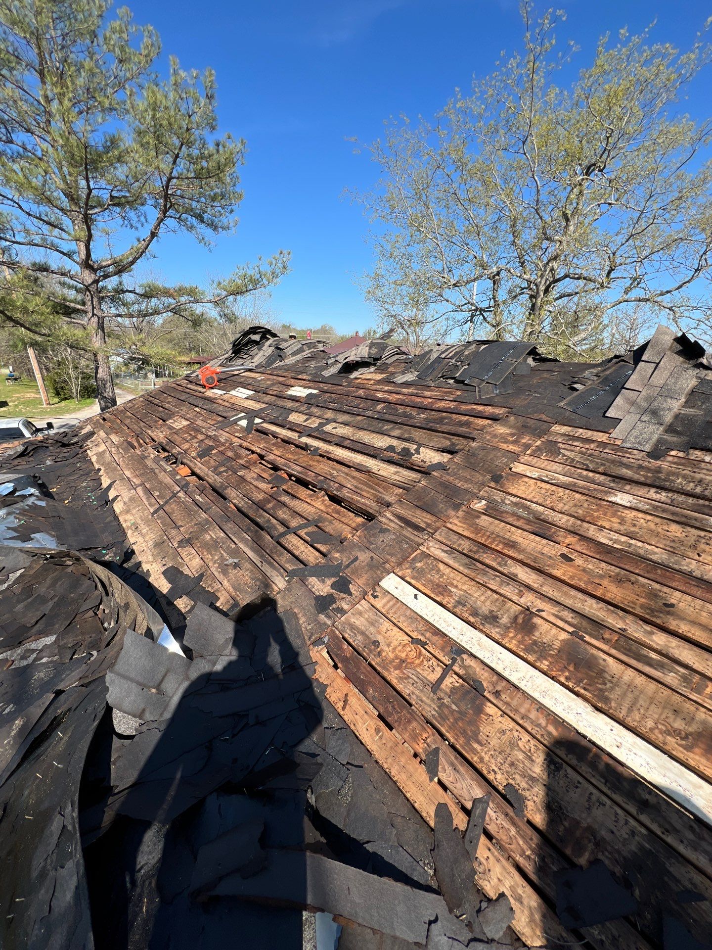 New Roof & Decking Brought to Code. by In & Out Construction & Remodeling, LLC
