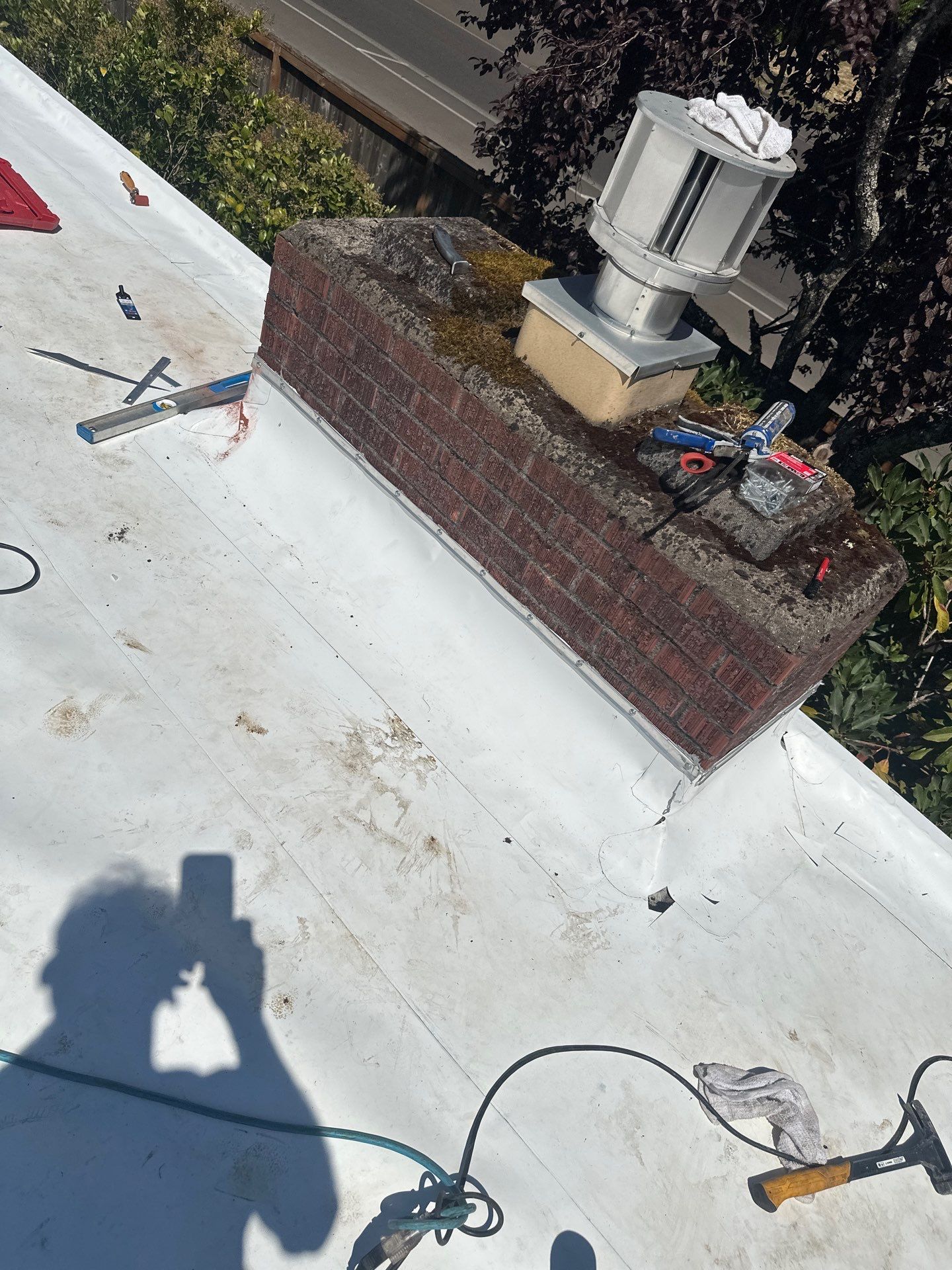 Residential Flat Roof Installation using GAF 60Mil TPO  by Orezona Building & Roofing Company, Inc.