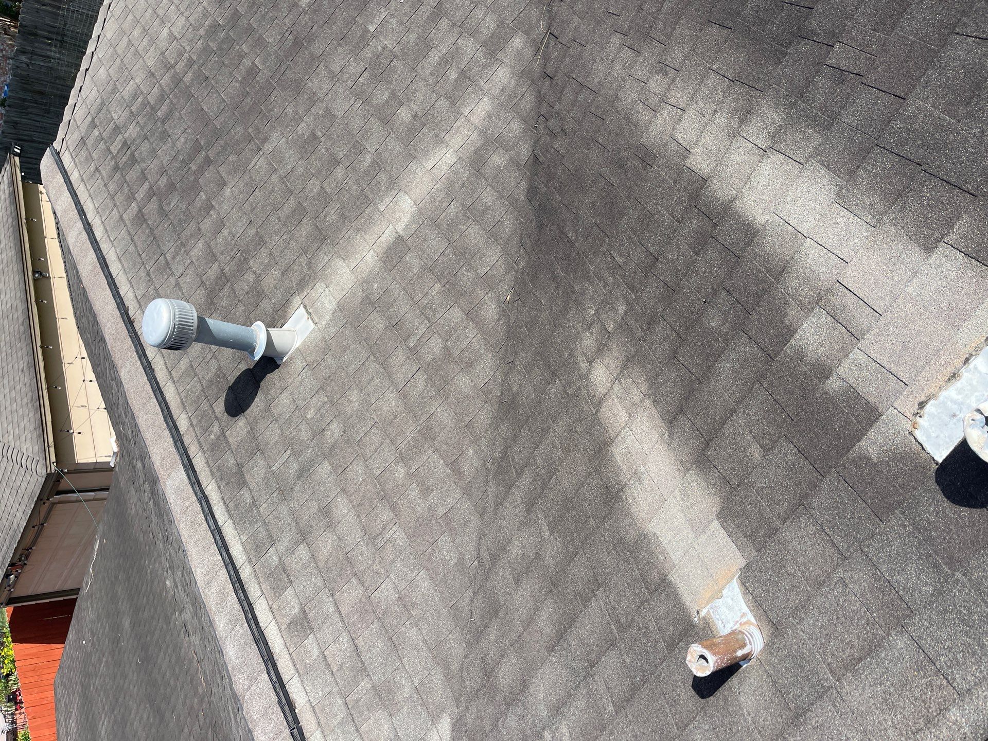 Hail Damage using Owen's Corning Duration (Lifetime) Shingles by Roof Repair Company