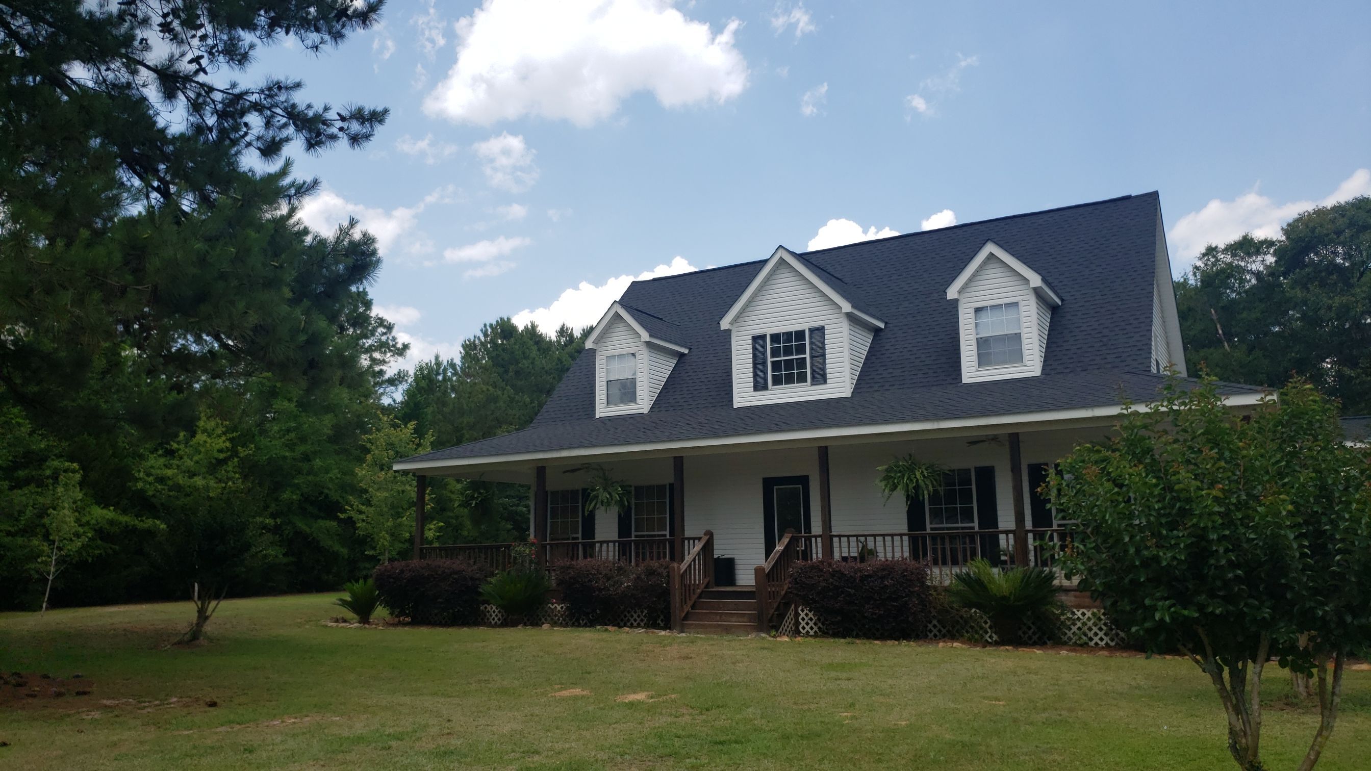 Residential Roofing Installation using Roof Replacement by American Roofing & Construction LLC