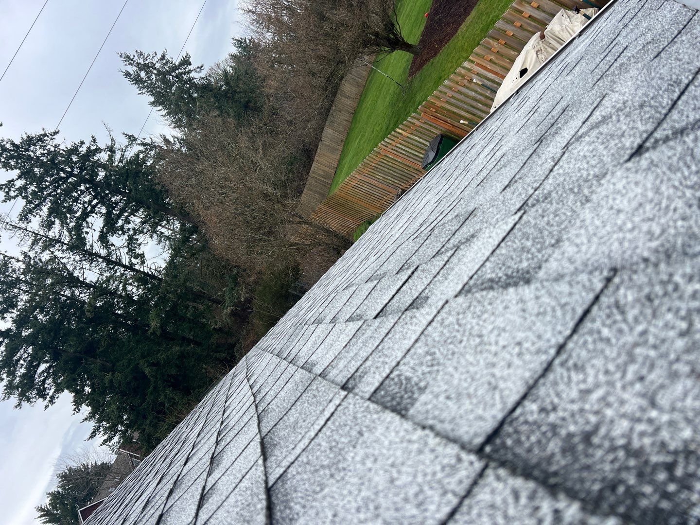 Residential Roofing Installation using IKO Cambridge (Color: Dual Grey) by Orezona Building & Roofing Company, Inc.