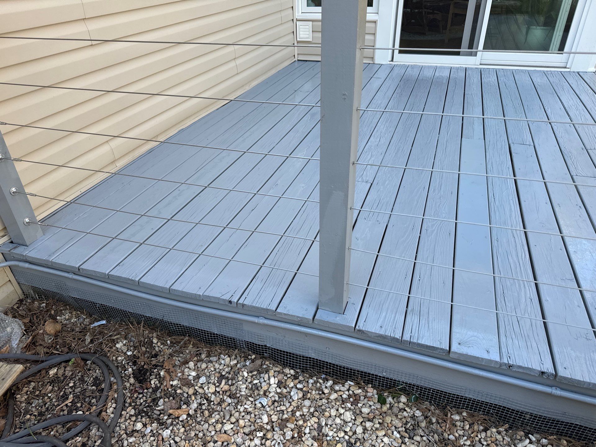 Deck staining by GonzalezPainters & Contractors Inc 