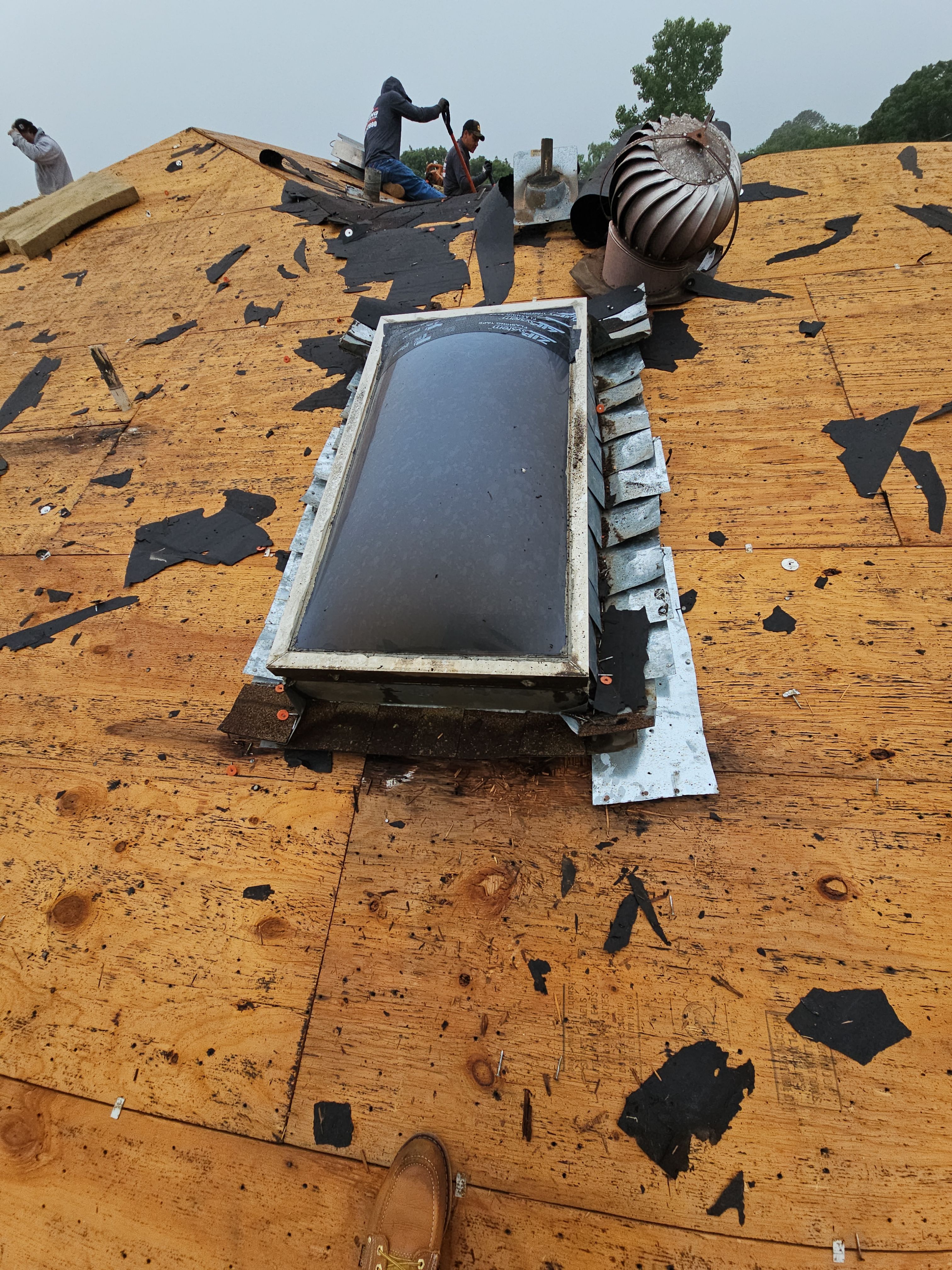 "Full Roof Replacement Due to Hail and Water Damage – Before & After" by road roofing llc
