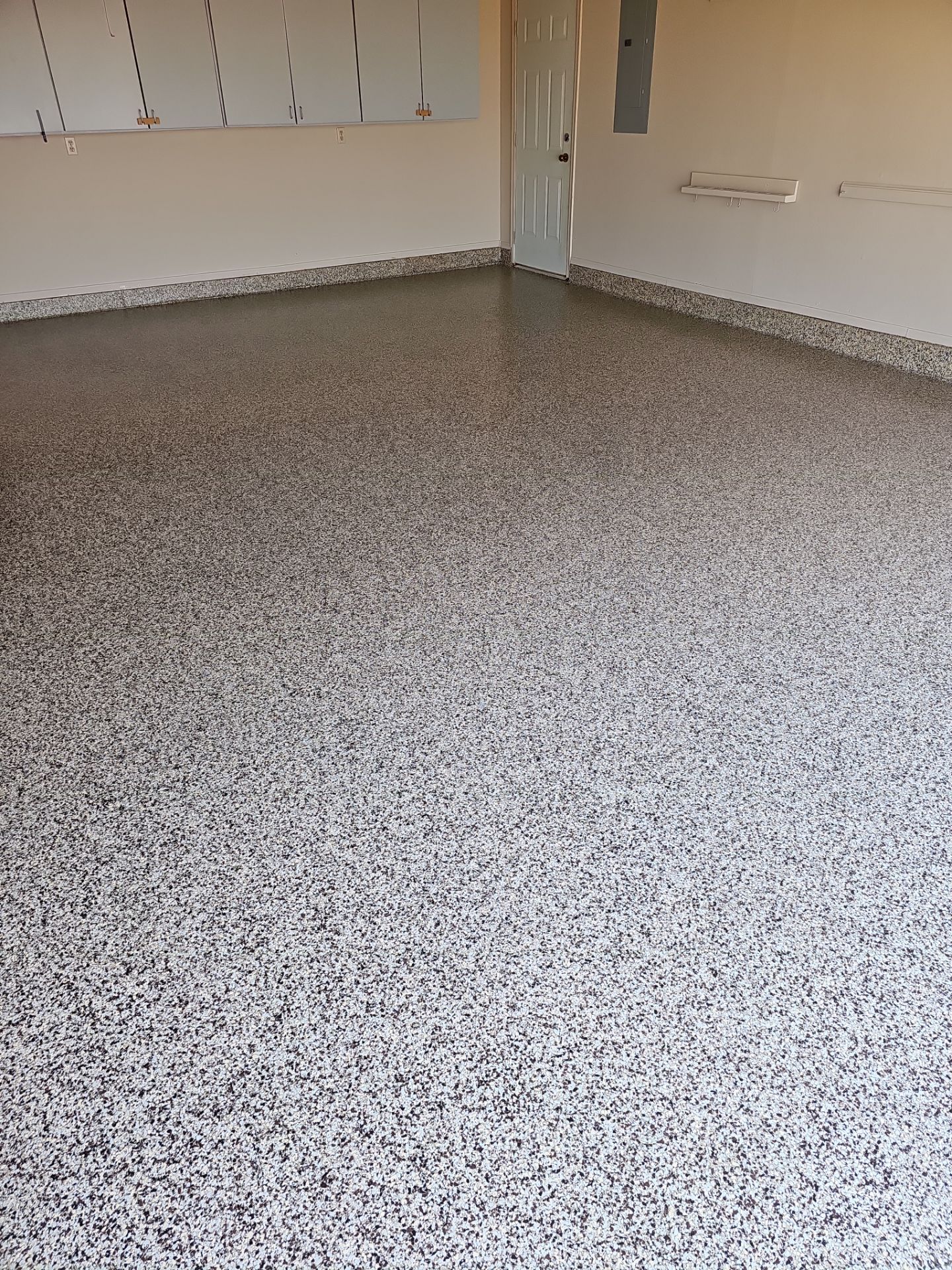 Garage Floor Coating with Cordwood by Copperhead Coatings