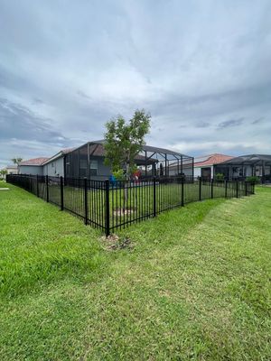 Aluminum Fence Installation using Black 3 Rail Aluminum Fence