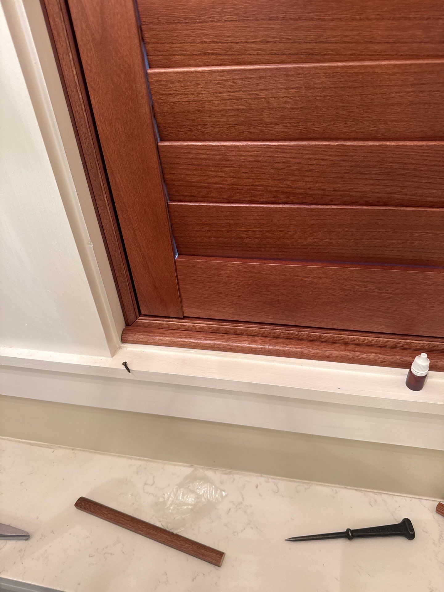 Stained Wood Plantation Shutter Upgrade for Arched Windows in St Joseph by tracy.hickman@budgetblinds.com