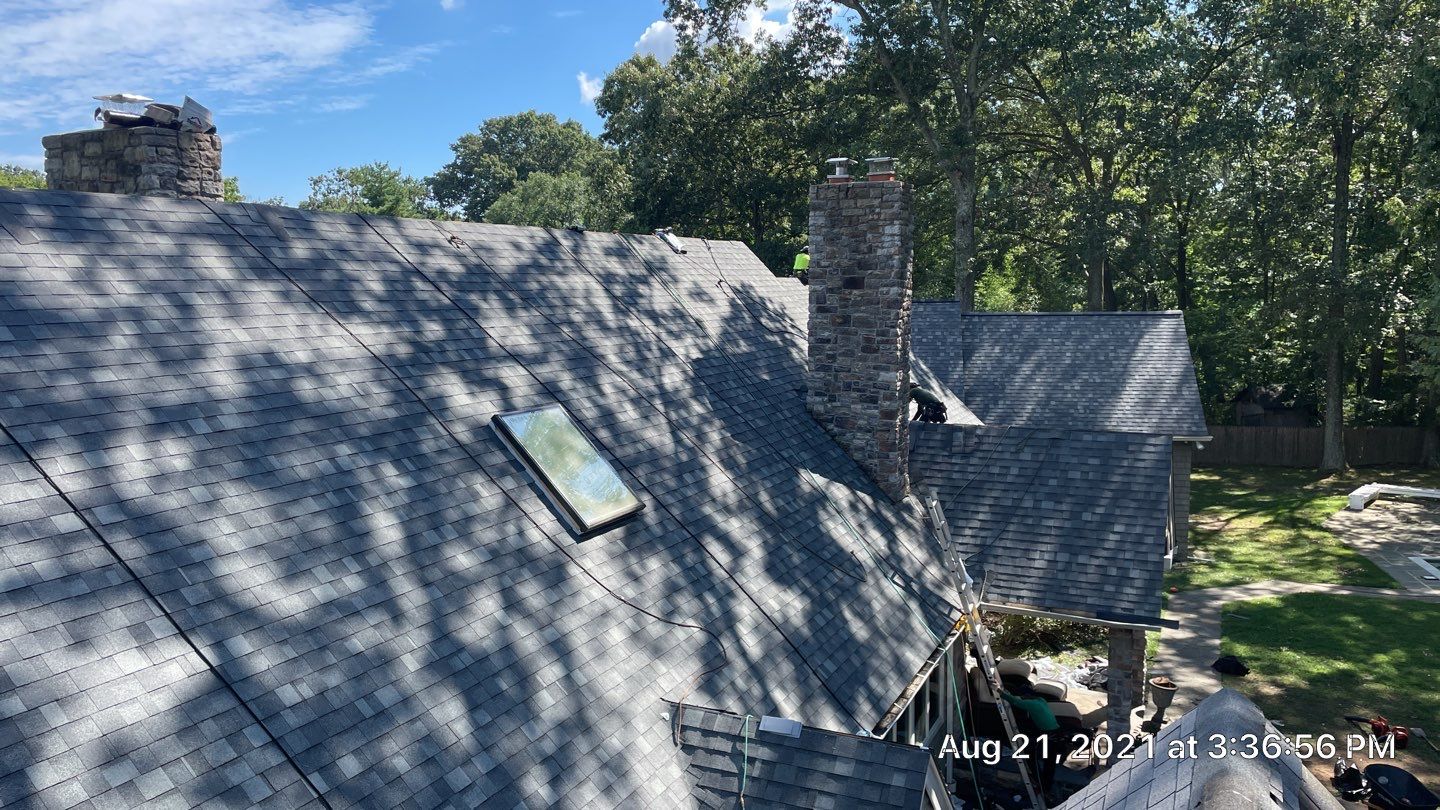 Roof Replacement using IKO Dynasty by American Home Contractors