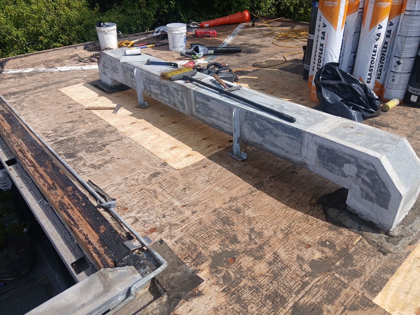 Residential Roofing Installation using Polyglass Torch Down Roofing System by Hull Brothers Roofing