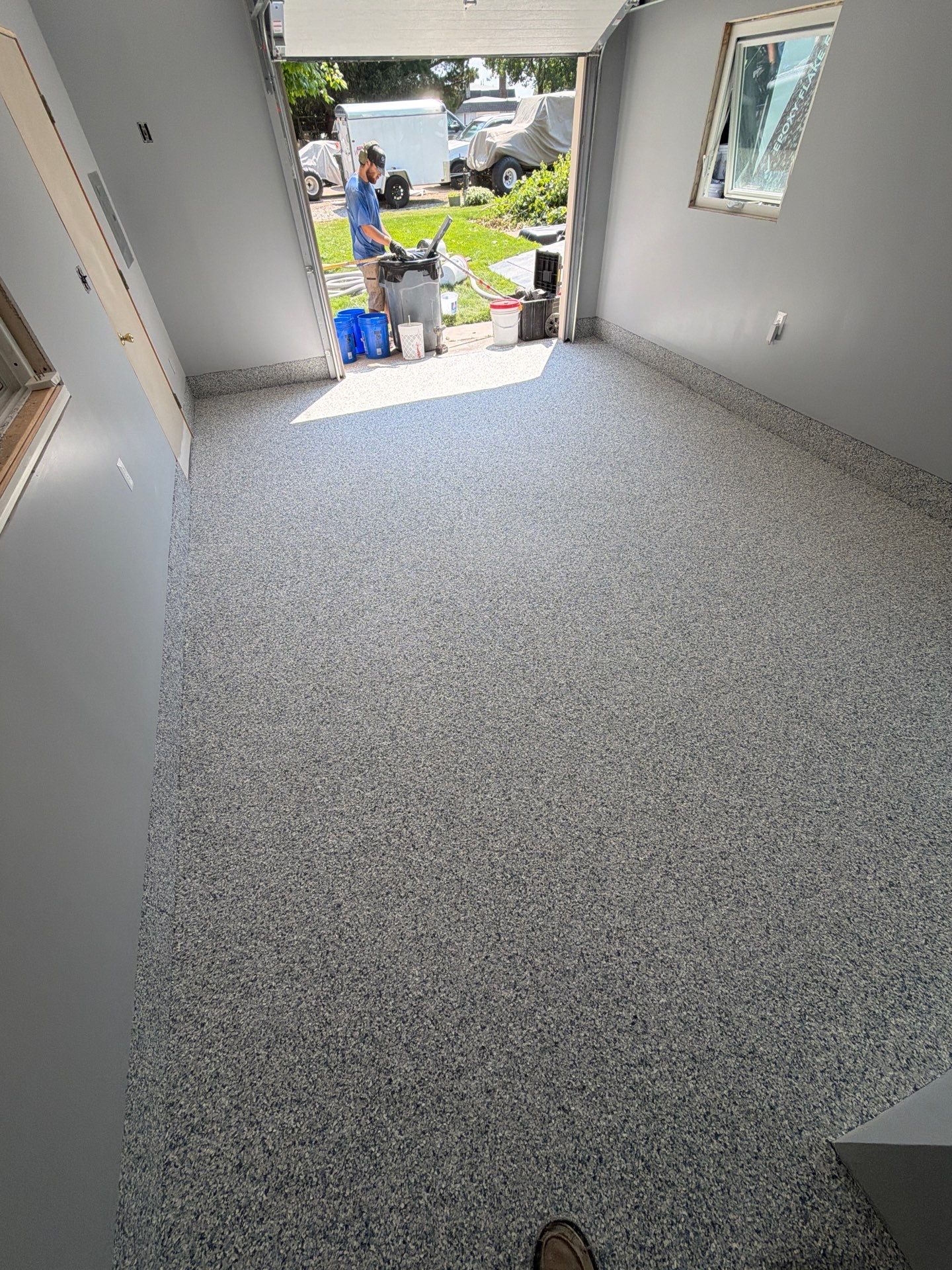 Custom Tidal Wave Epoxy Flake Floor Installation in Mears by Gordon Painting