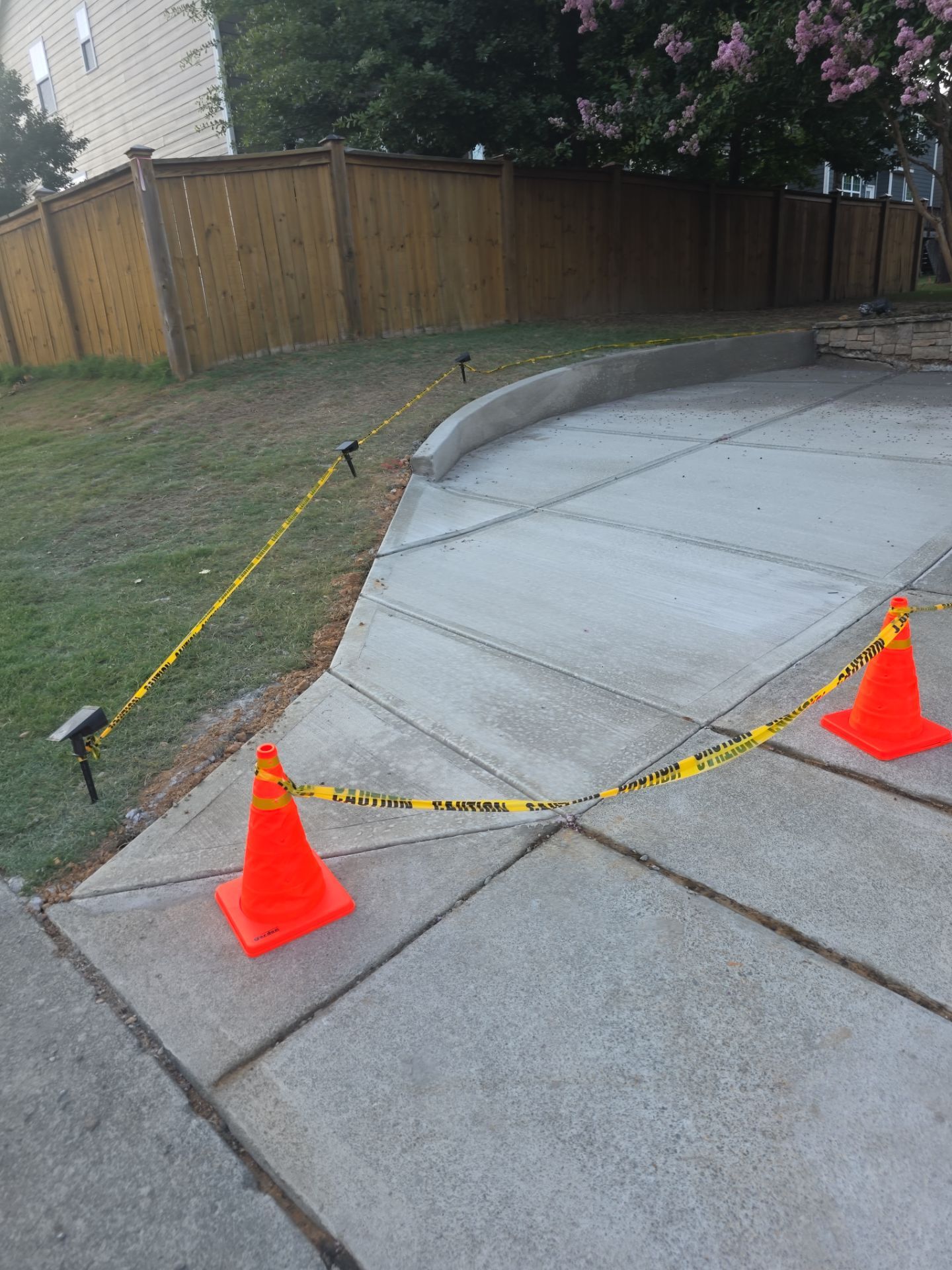Concrete Driveway Expansion & Retaining Wall | Apex, NC by Elite Remodeling and Design LLC