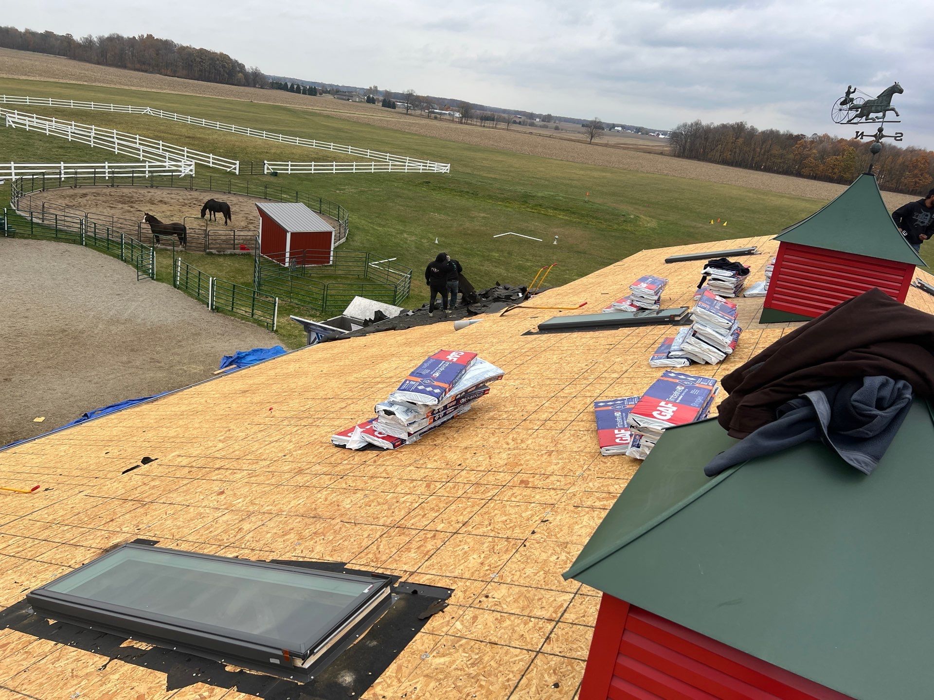 Residential Roofing Replacement with Multiple Skylights in Mason, Michigan by Acme Exteriors
