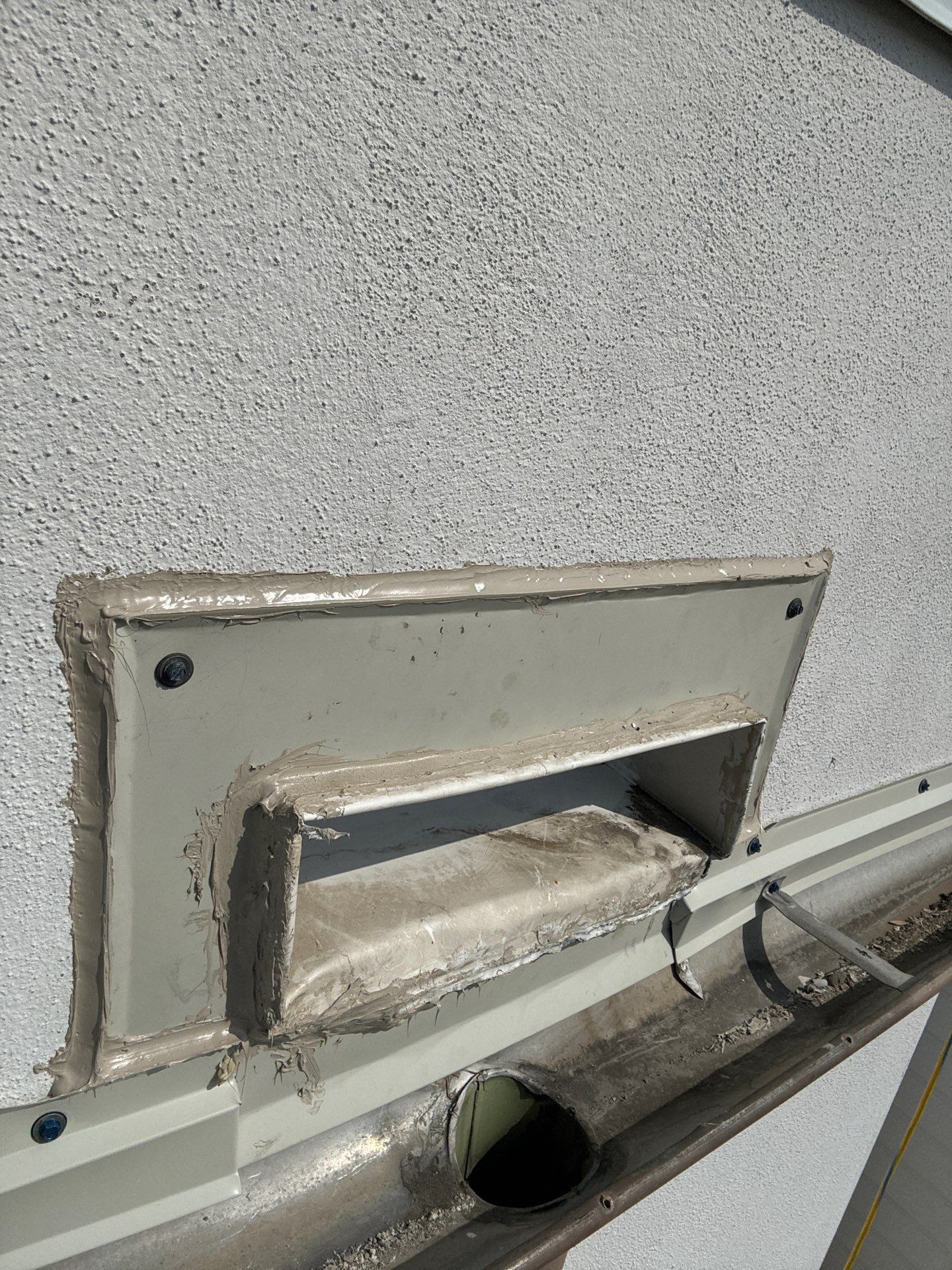Scupper Repair Wall Leak by Associates Roofing Unlimited