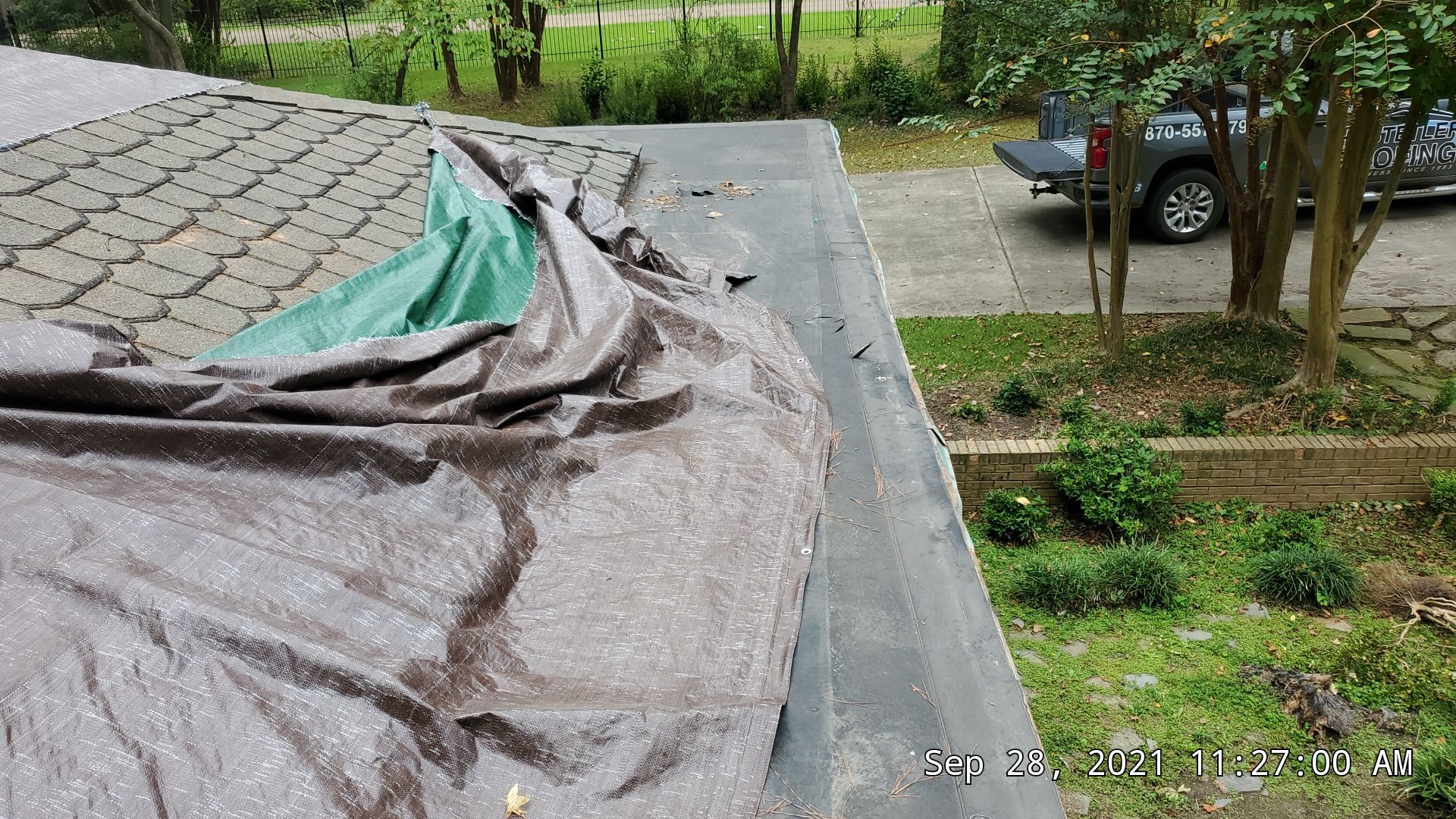Residential Roofing Installation using PVC membrane and 24 gauge Standing Seam Metal by Hostetler Roofing