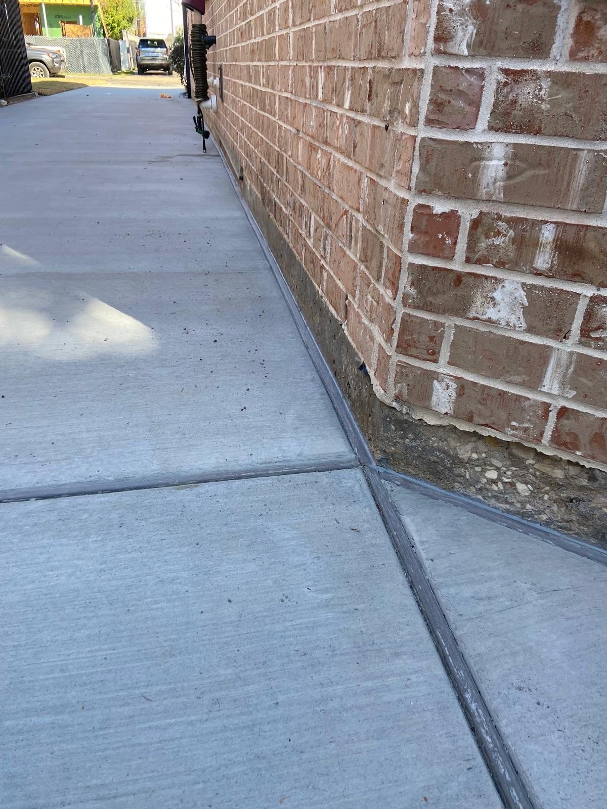 Driveway Concrete Replacement & French Drainage System by Texas Urban Elements