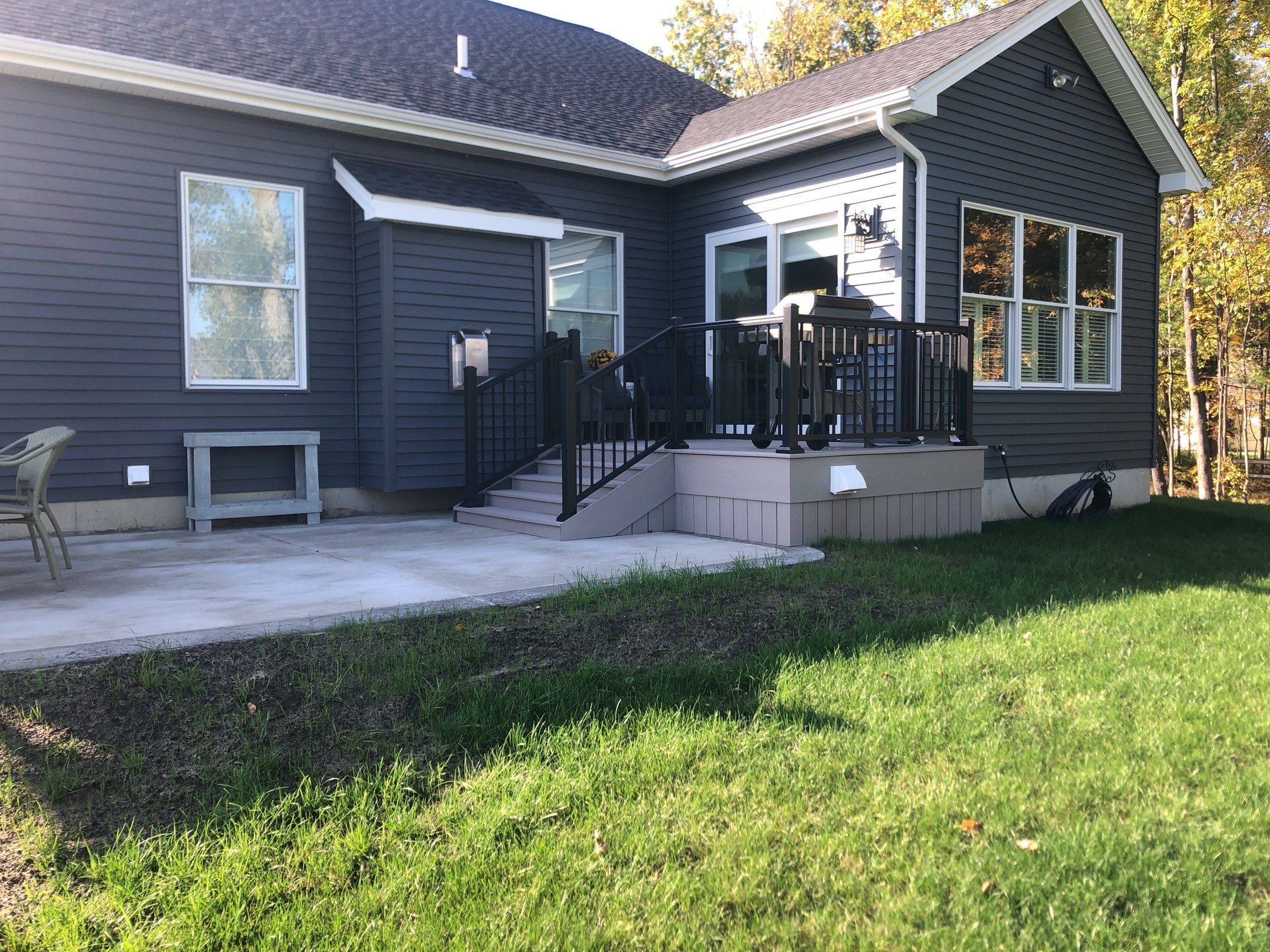 Outdoor Living- Deck and Concrete by Ivy Lea Construction