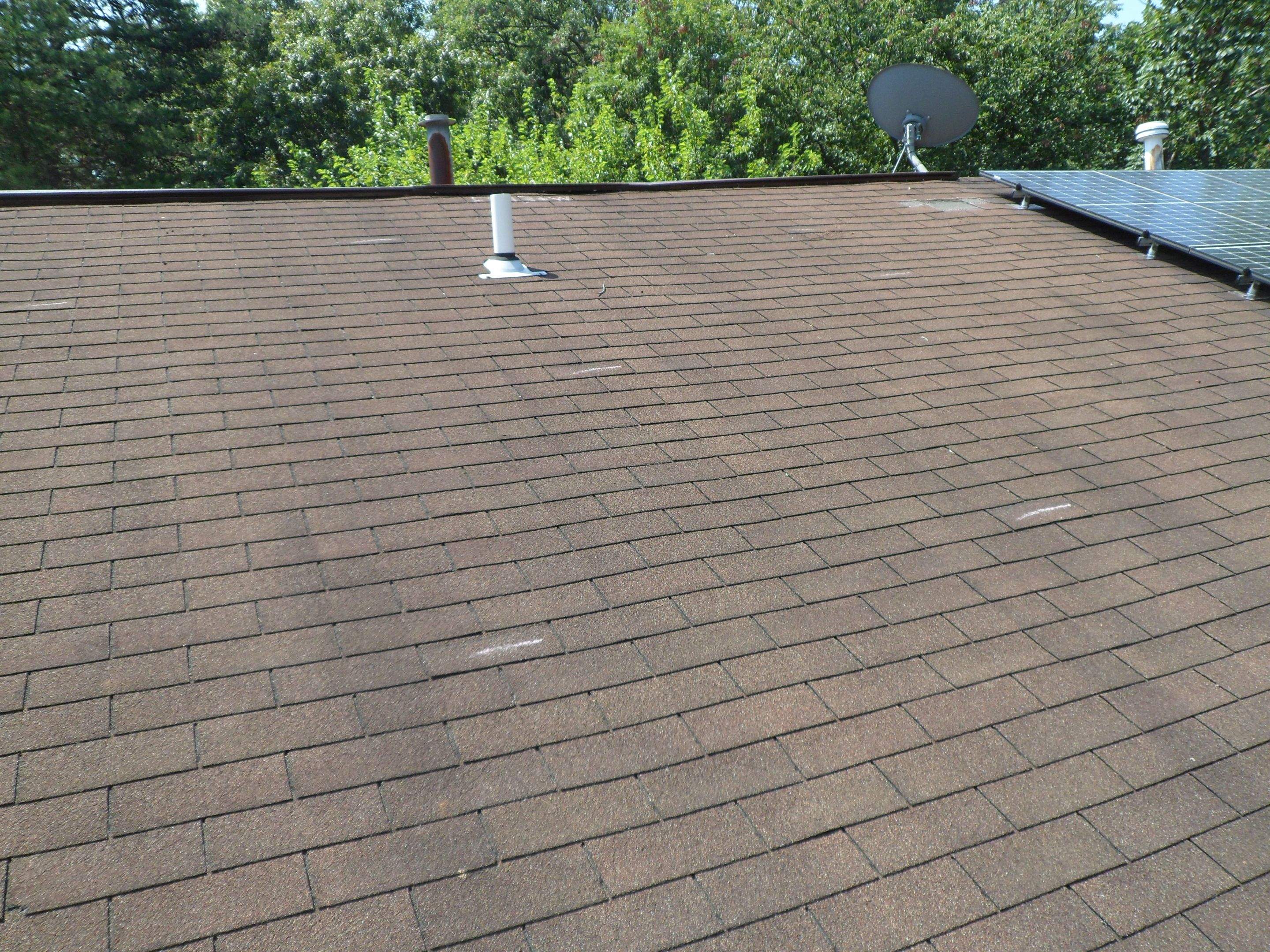 Residential Roofing Installation using Landmark Shingles Color Weatherwood by Alpha Design Services