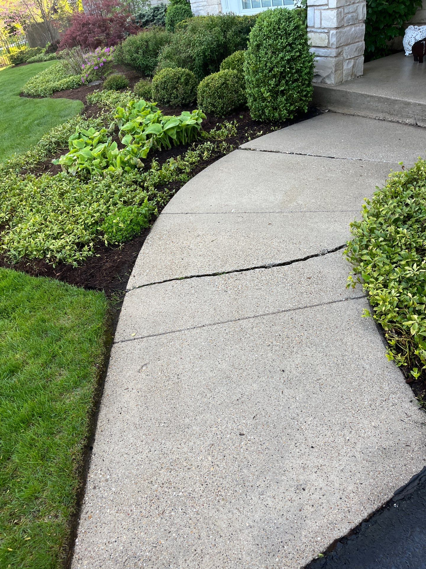 natural stone using Algaecide, soft wash soap by Northern Power Washing LLC.