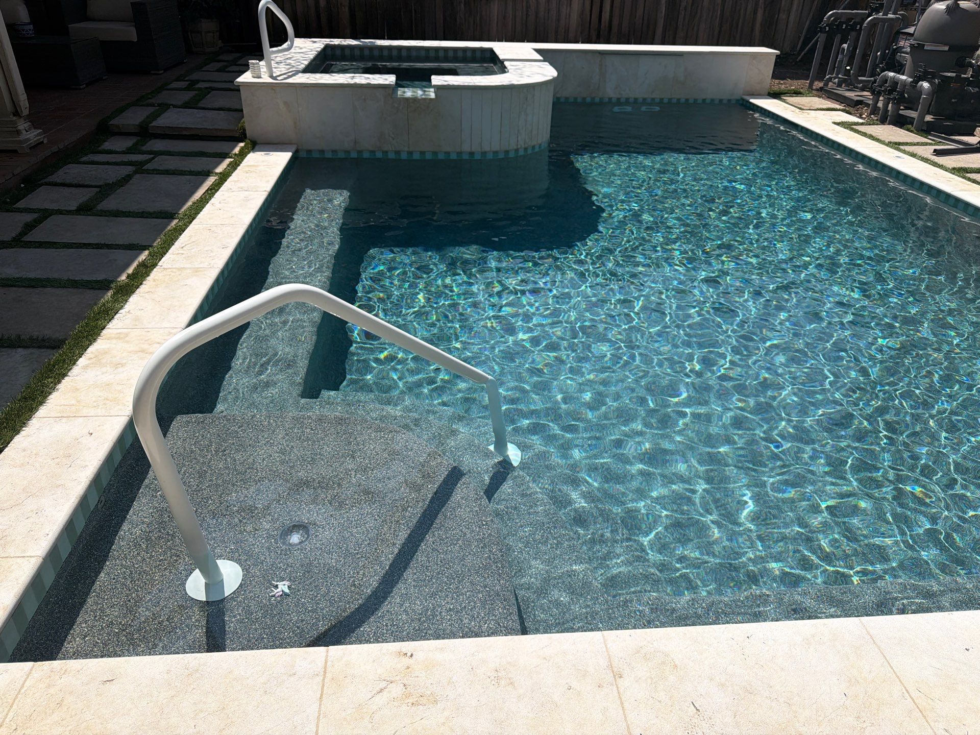 Modern Geometric Pool with Raised Spa and Travertine Deck by Pinnacle Pools and Spas - DFW