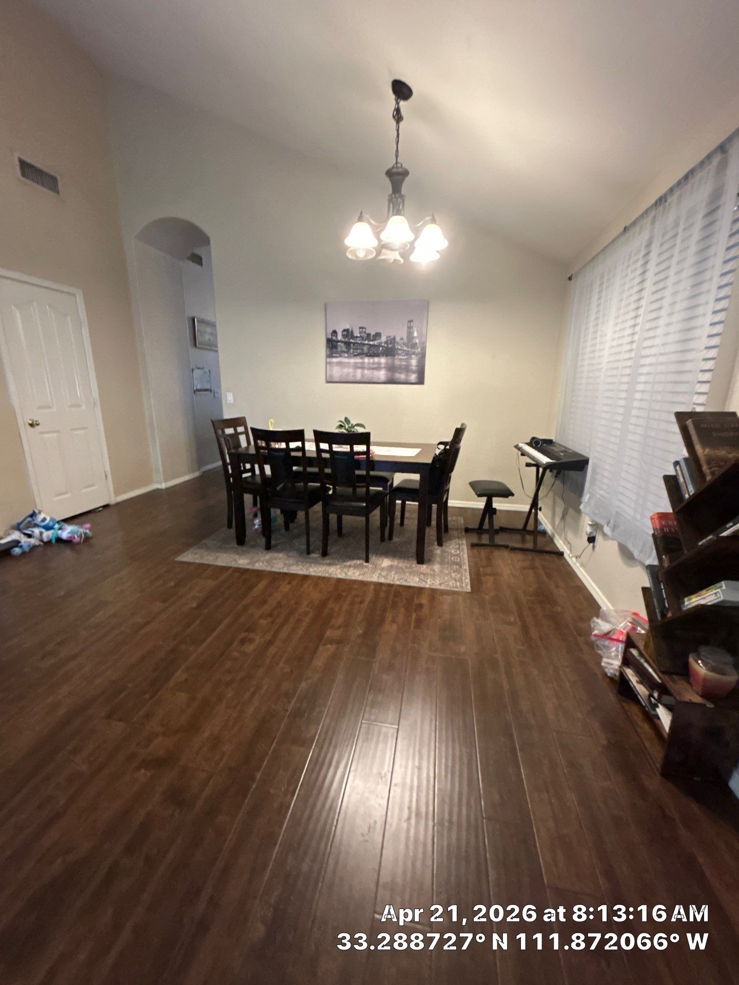 Dark Wood Laminate Floor Installation and Dining Room Renovation in Chandler by CompanyCam Sales Demo
