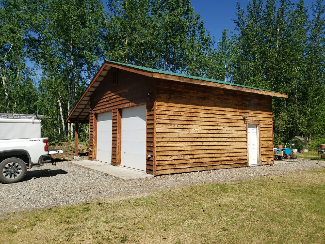 Brightened Cedar Siding & Garage by Midnight Sun Painting