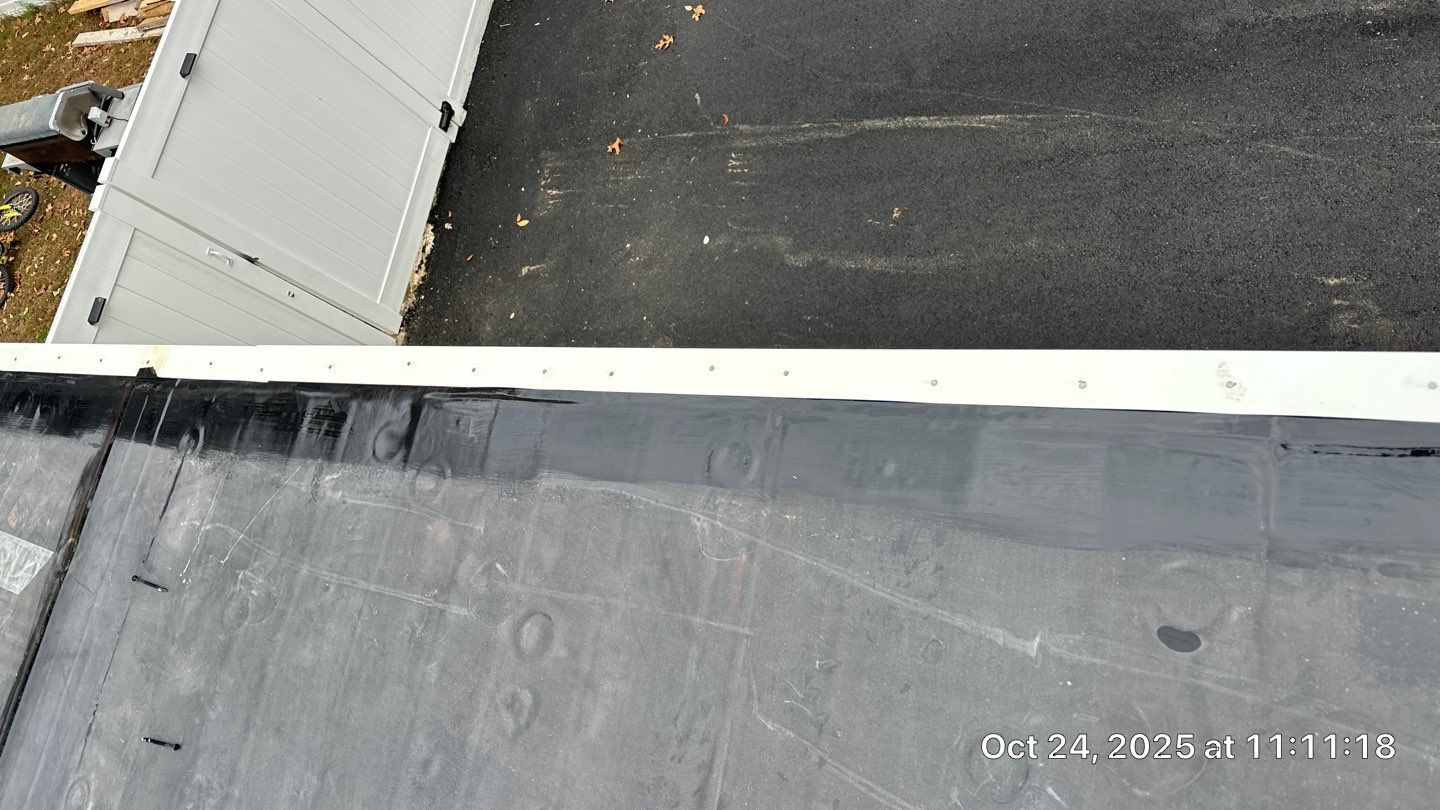 Westford EPDM Flat Roof with Gutter & Soffit/Fascia Replacement by Mighty Dog Roofing of Greater Middlesex County