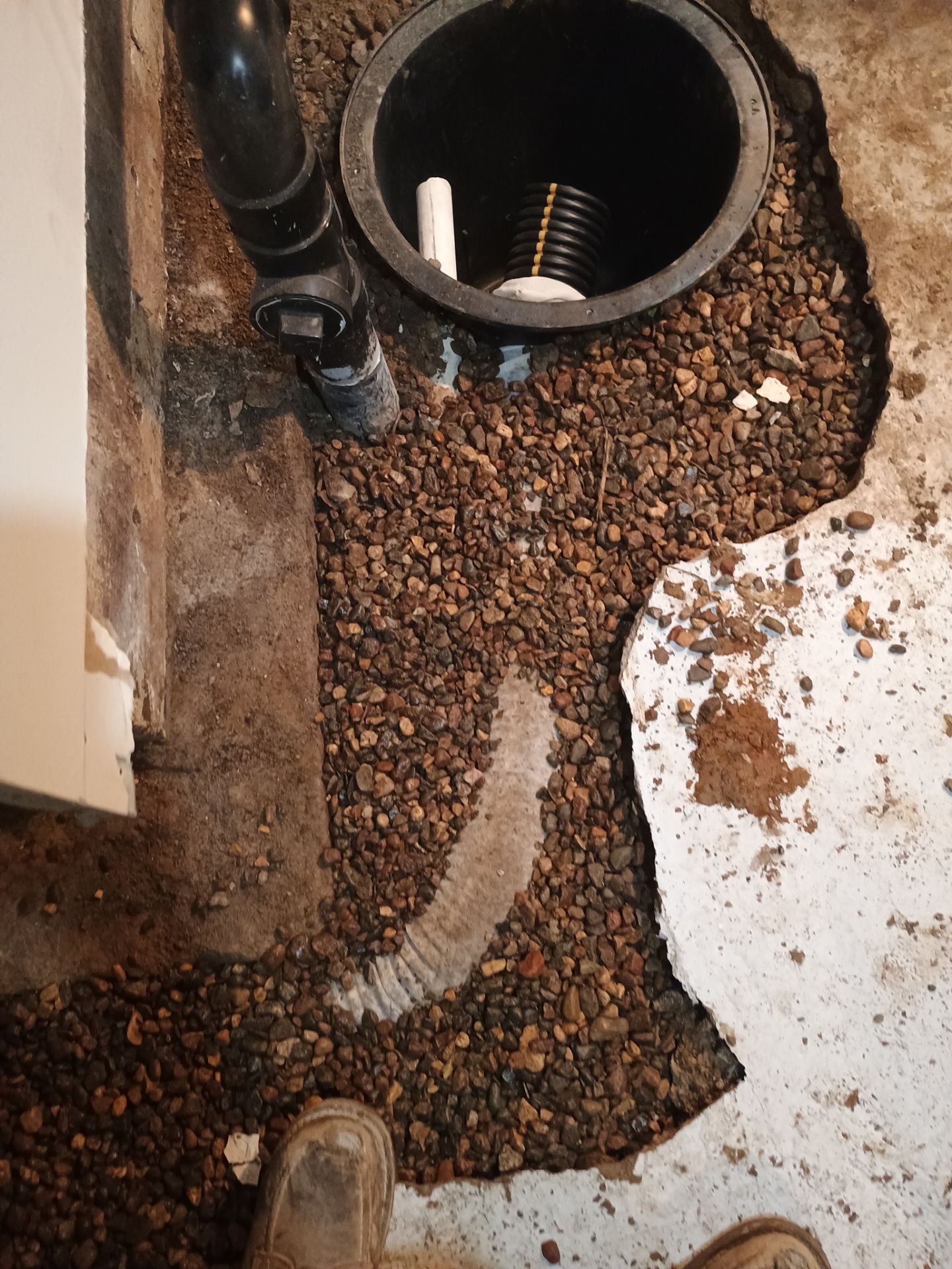 Interior Drain Tile & Sump Pump Installation in St. Paul, MN by Waterproofing Northeast