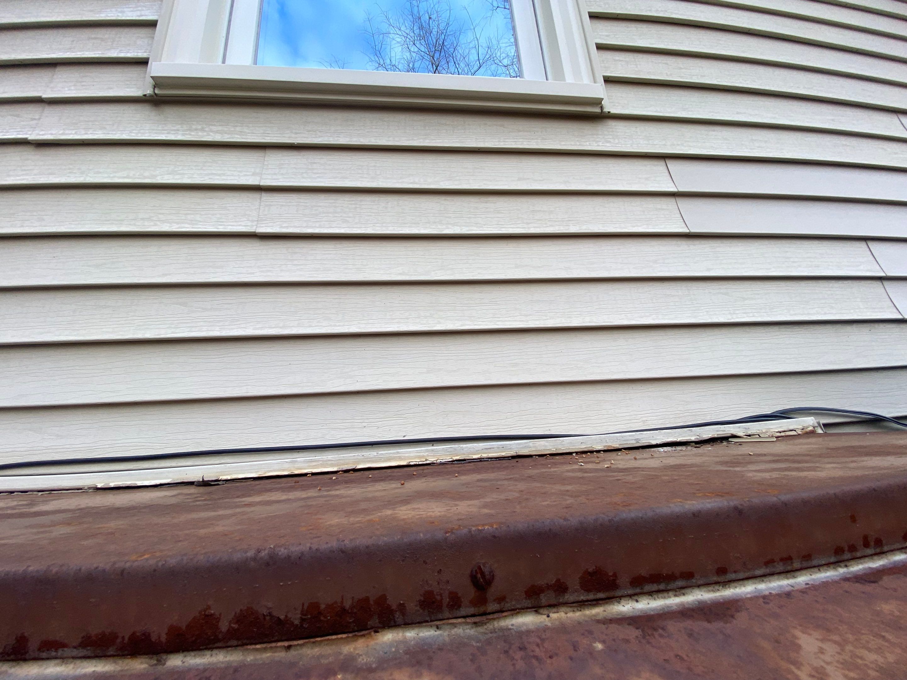 New Bilco doors to basement & new front porch posts by The Smet Companies, LLC