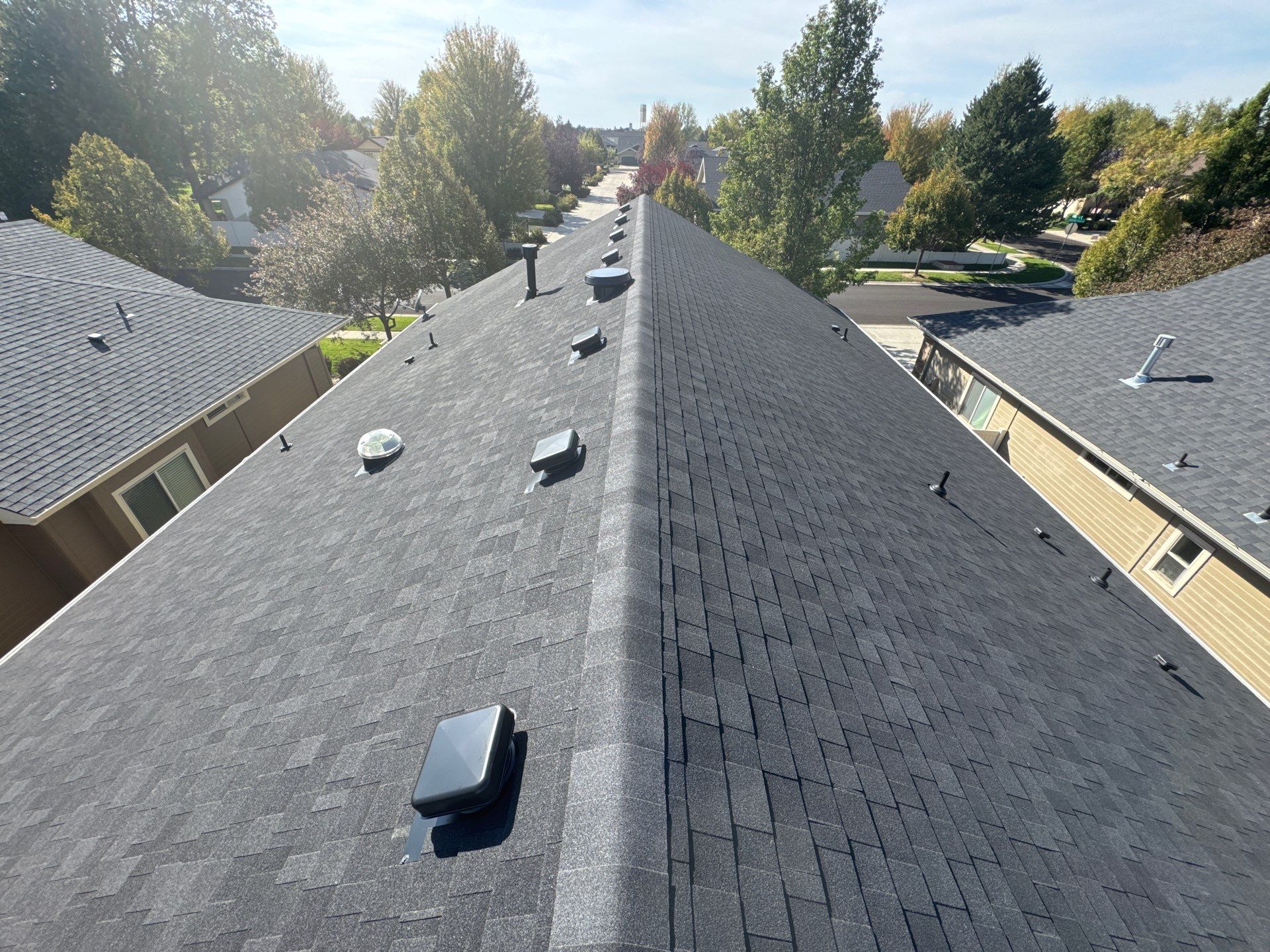 Residential Roof Replacement With Charcoal Architectural Shingles in Meridian by Olive Roofing