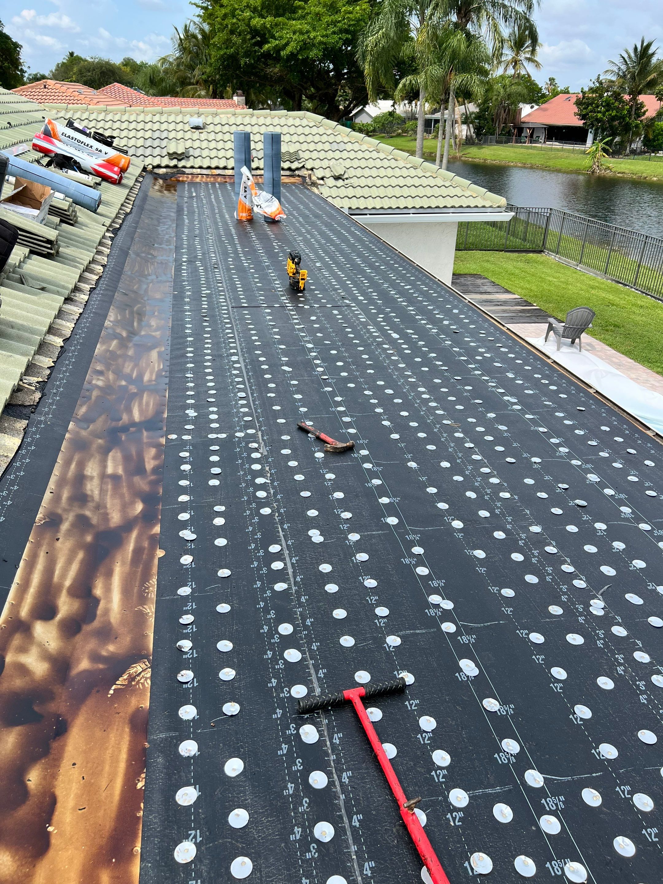 Residential Re-Roof using Polyglass Self-Adhered Flat Deck by First Due Roofing