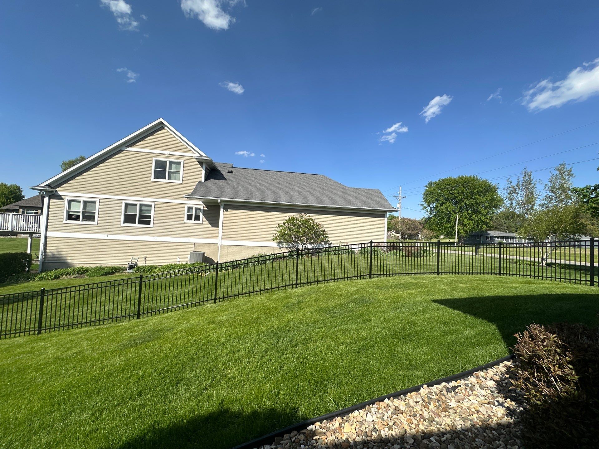 Black Ornamental Metal Picket Fence Installation in Waterloo by Perfect Picket Fence and Stain