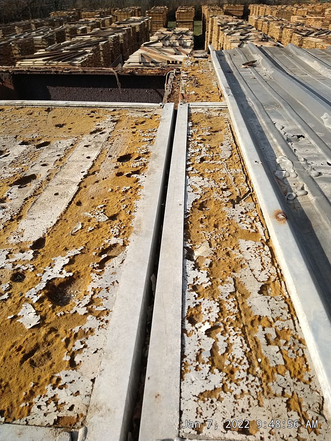 Commercial Roofing Installation using Aluminum Roofing panels by Hostetler Roofing