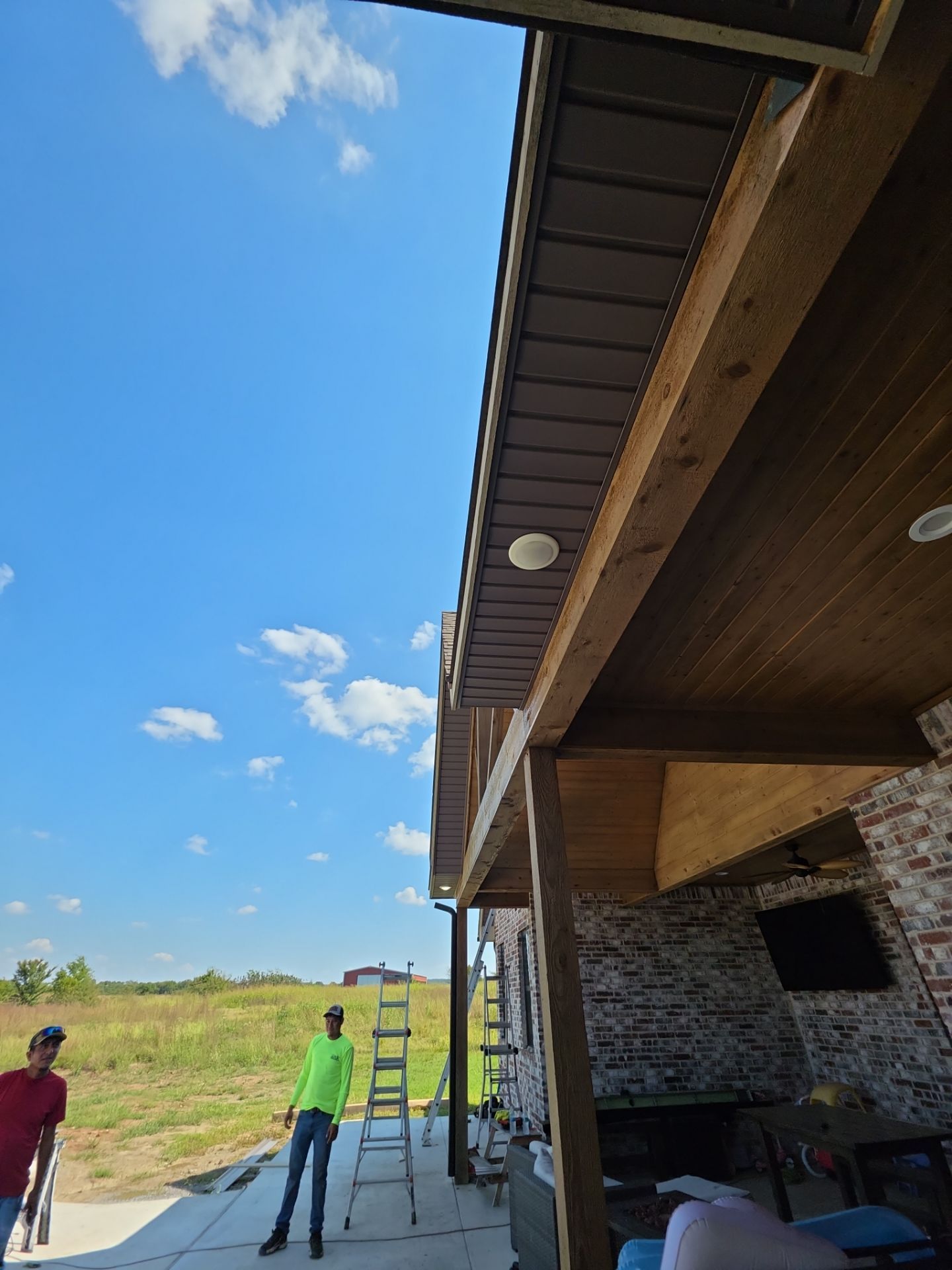 Fascia and door frames wrapped with PVC coil & soffit installation by In & Out Construction & Remodeling, LLC