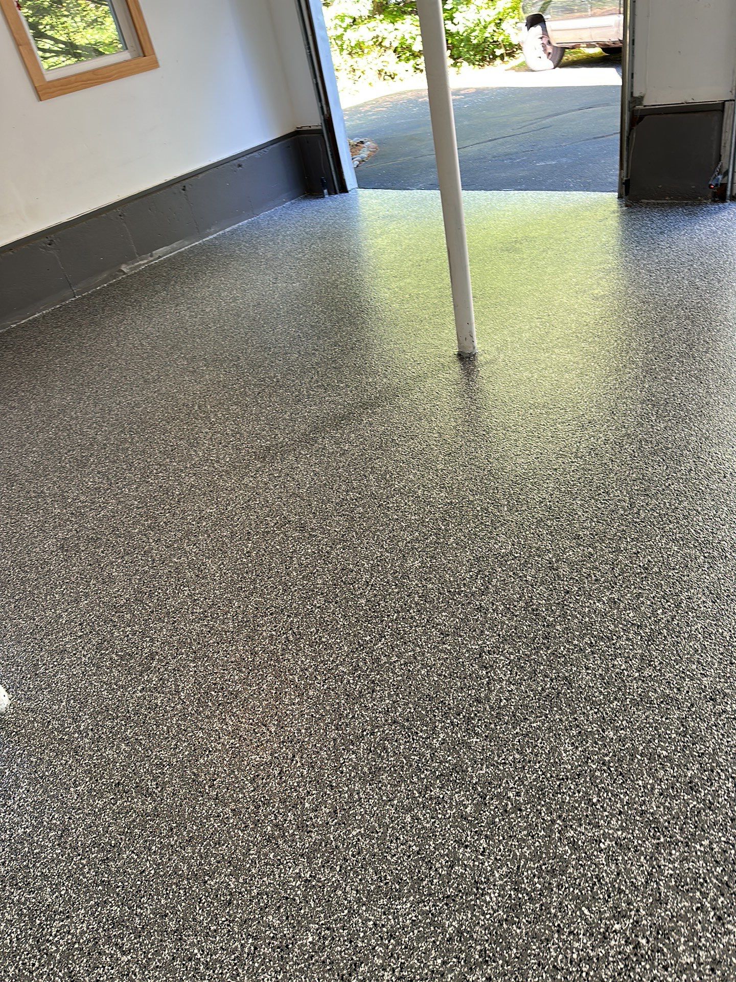 Cosentino Garage TransFLOORmation by Symphony Concrete Coatings
