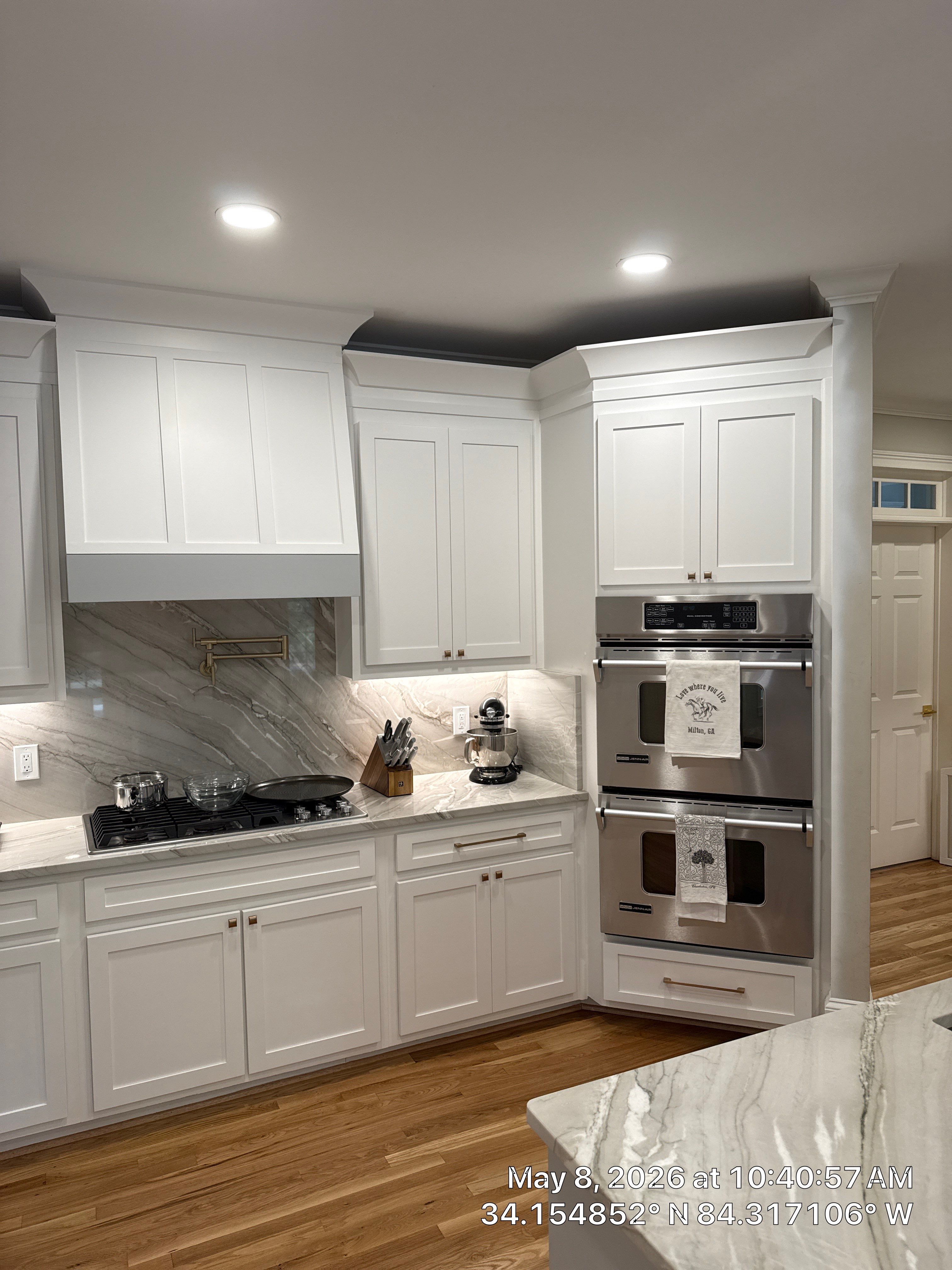 Alpharetta Kitchen Remodel Featuring Double Islands and White Quartz by Heart & Home Kitchen & Bath Remodeling LLC