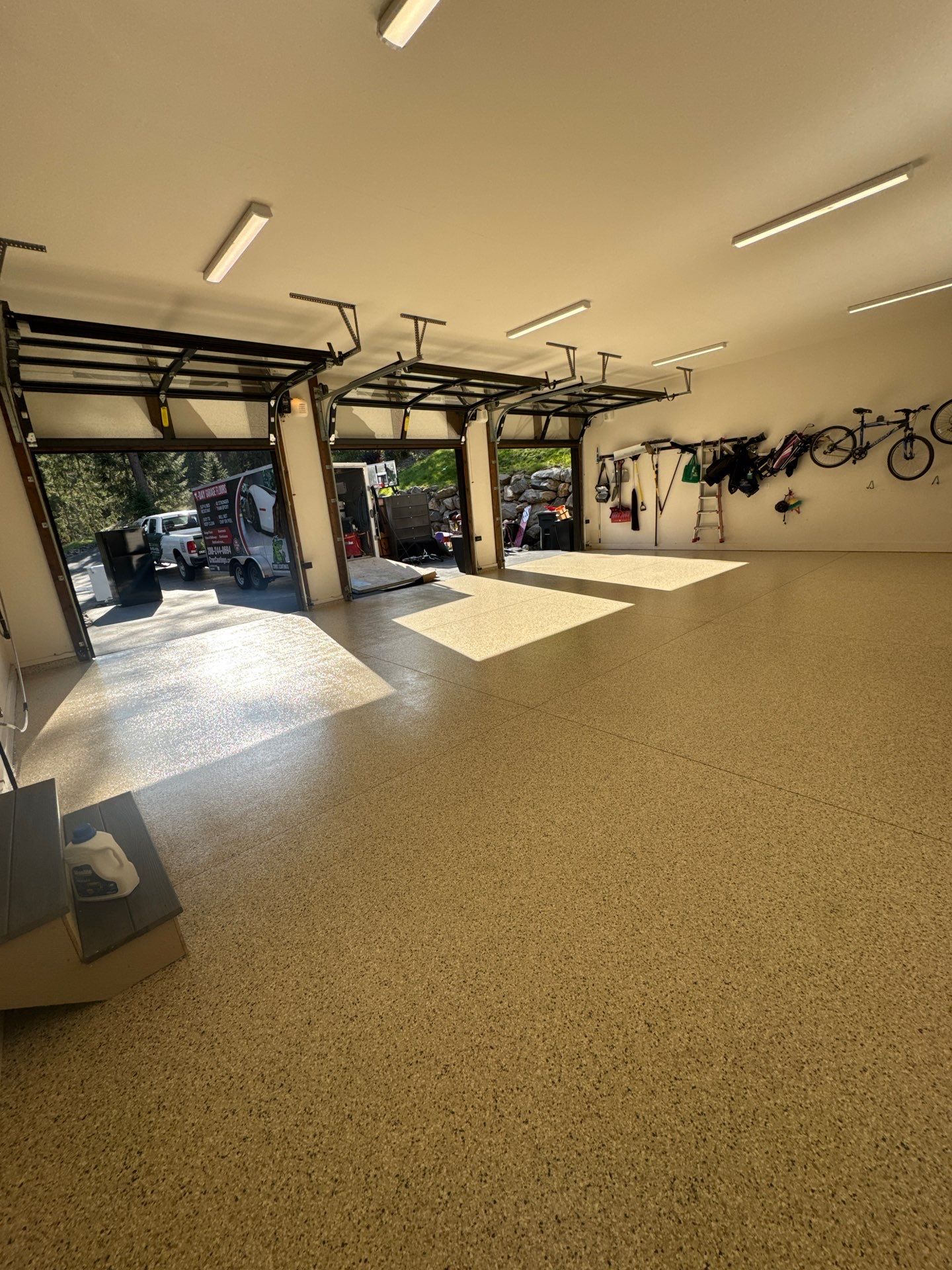 Driftwood Flake Garage Floor Transformation in Coeur d'Alene by Croc Coatings, LLC