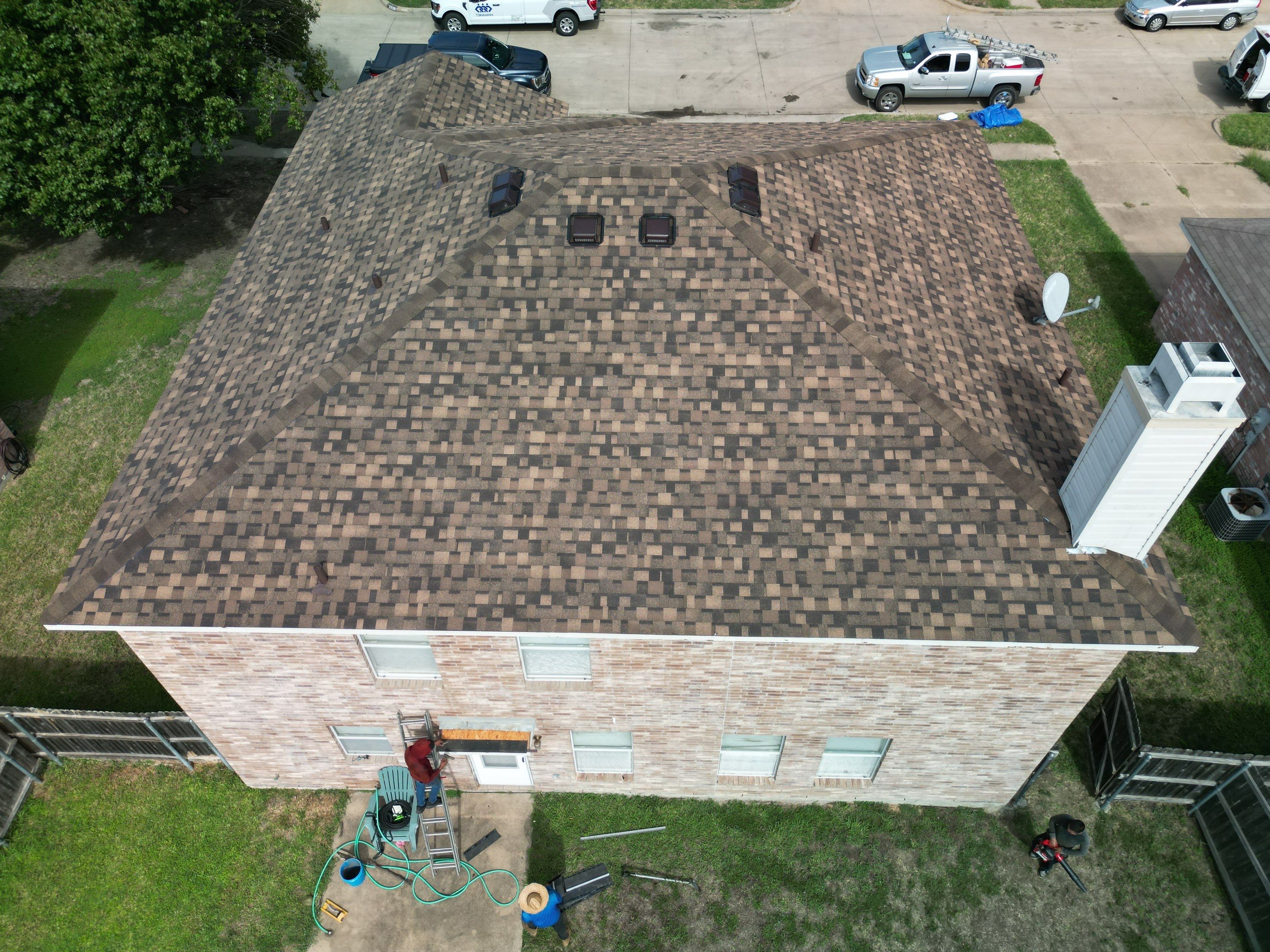 Full Roof Replacement, Chimney Rebuild and Interior Damage Replacement by First United Roofing & Construction