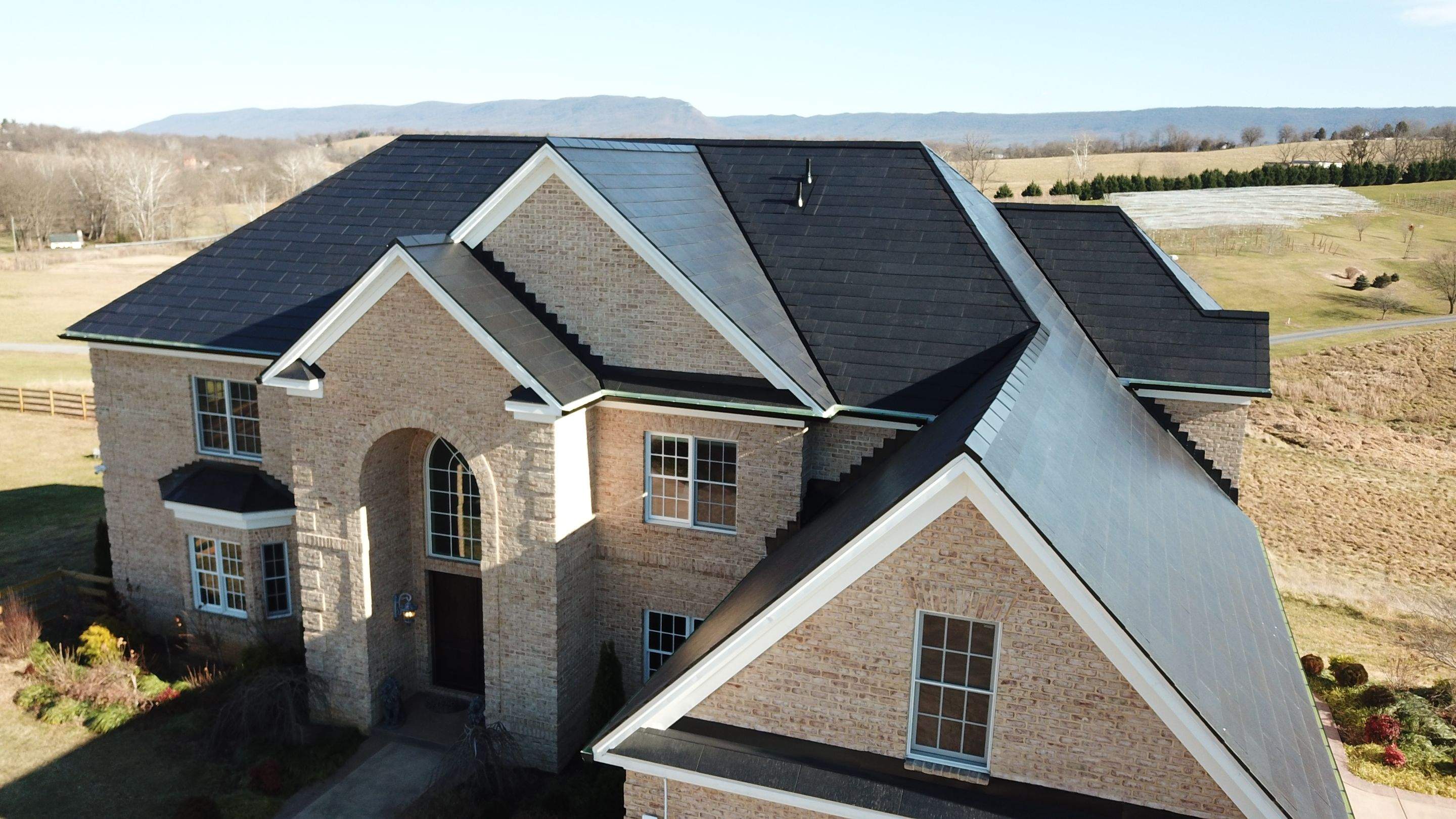 Tesla Solar Roof Replacement  by American Home Contractors