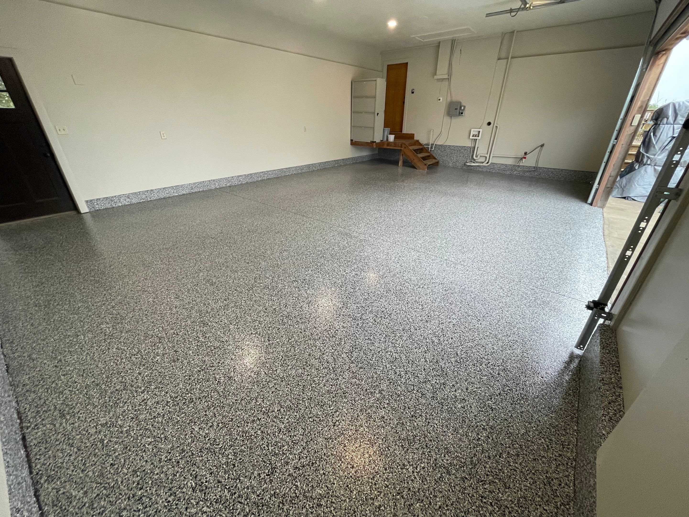 Domino Flake Floor Coating and Crack Repair in Chancellor by Select Painting, Coatings & Garage Cabinets