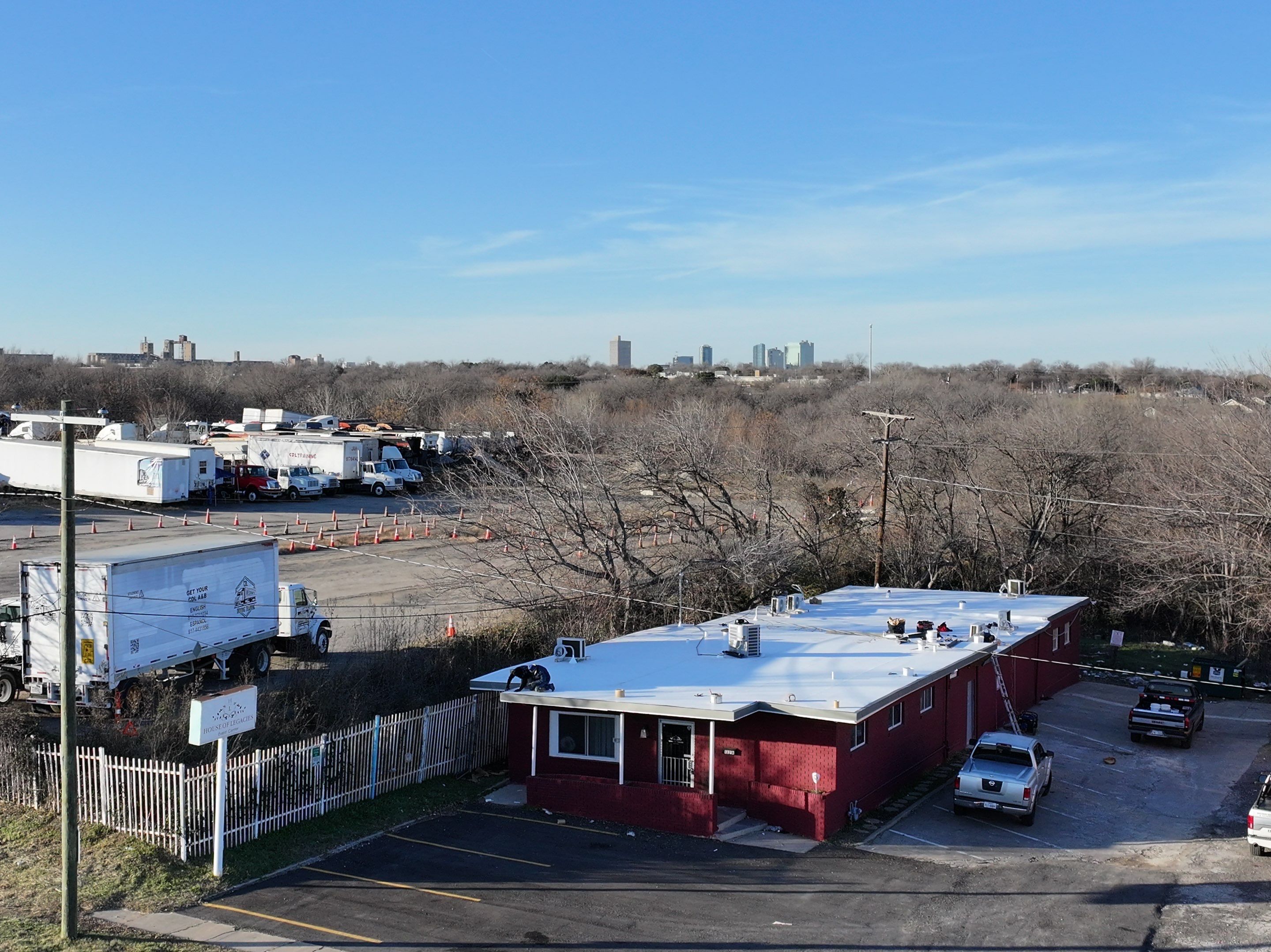 Commercial roofing overlay using GAF TPO over an old ballast roof by Becker Roofing and Exteriors