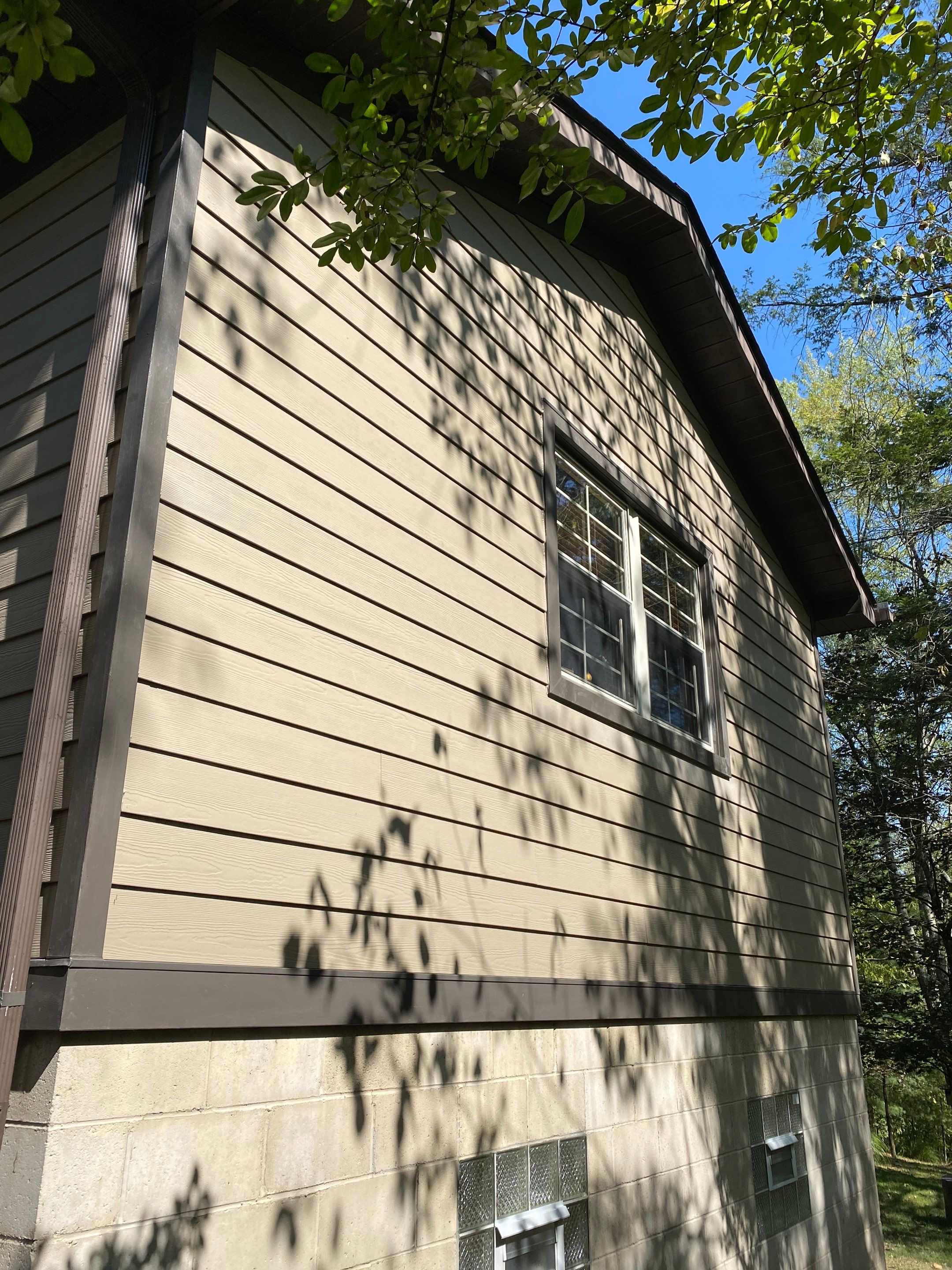 Hardie siding project  by Cousins Roofing Siding & Decks