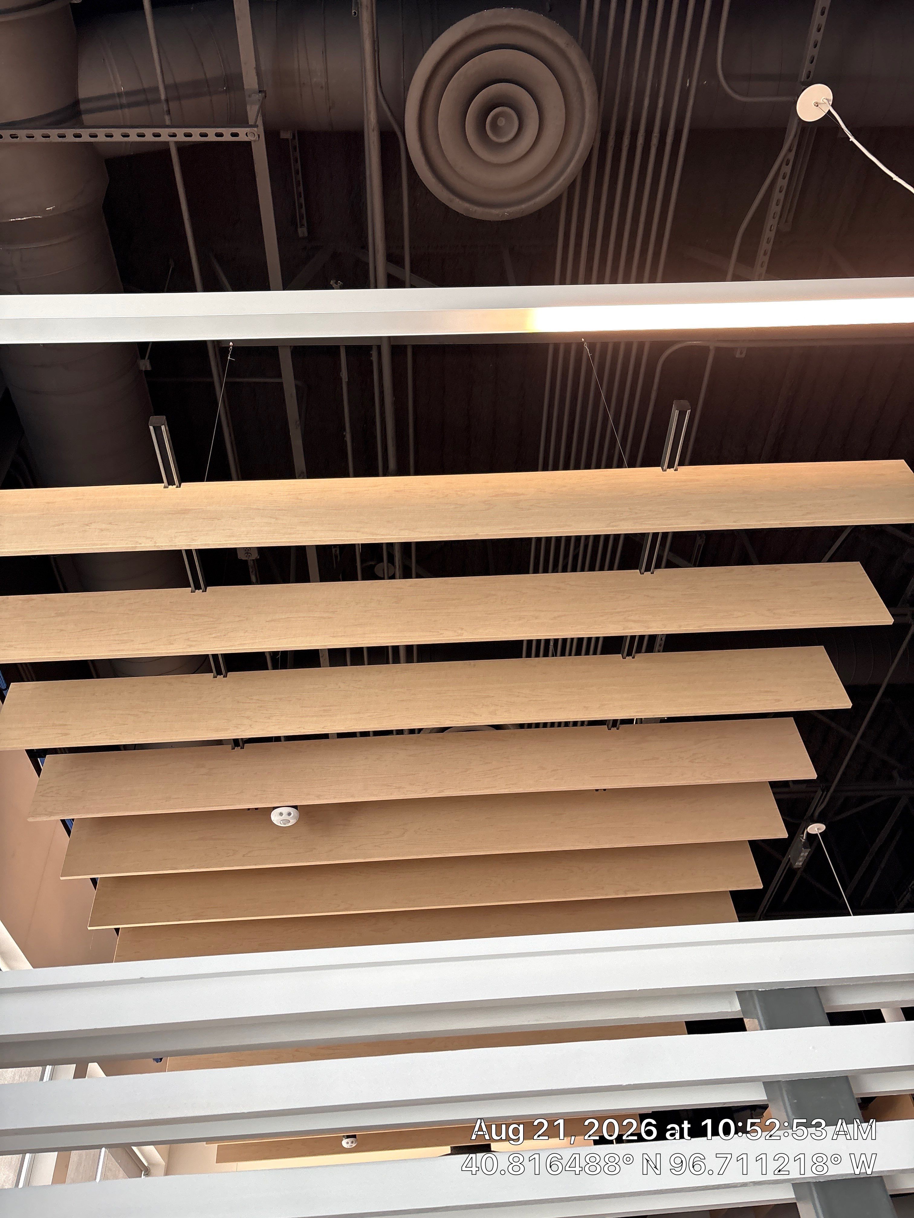 Lincoln Office Renovation Featuring Architectural Wood Baffles and Window Repair by CompanyCam Sales Demo