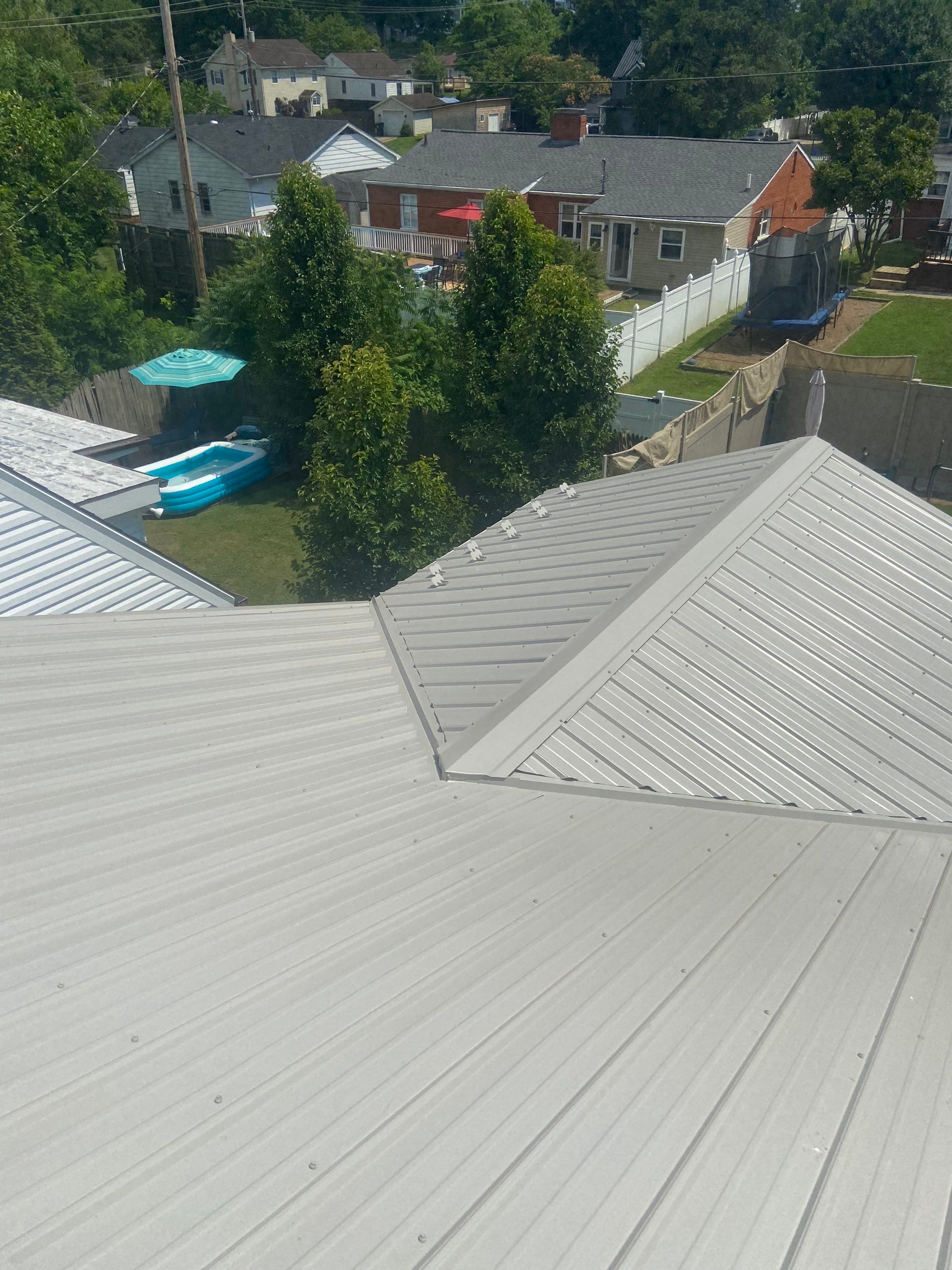 Metal Roofing, Skylights, Porch Build by Secure Construction Company Inc