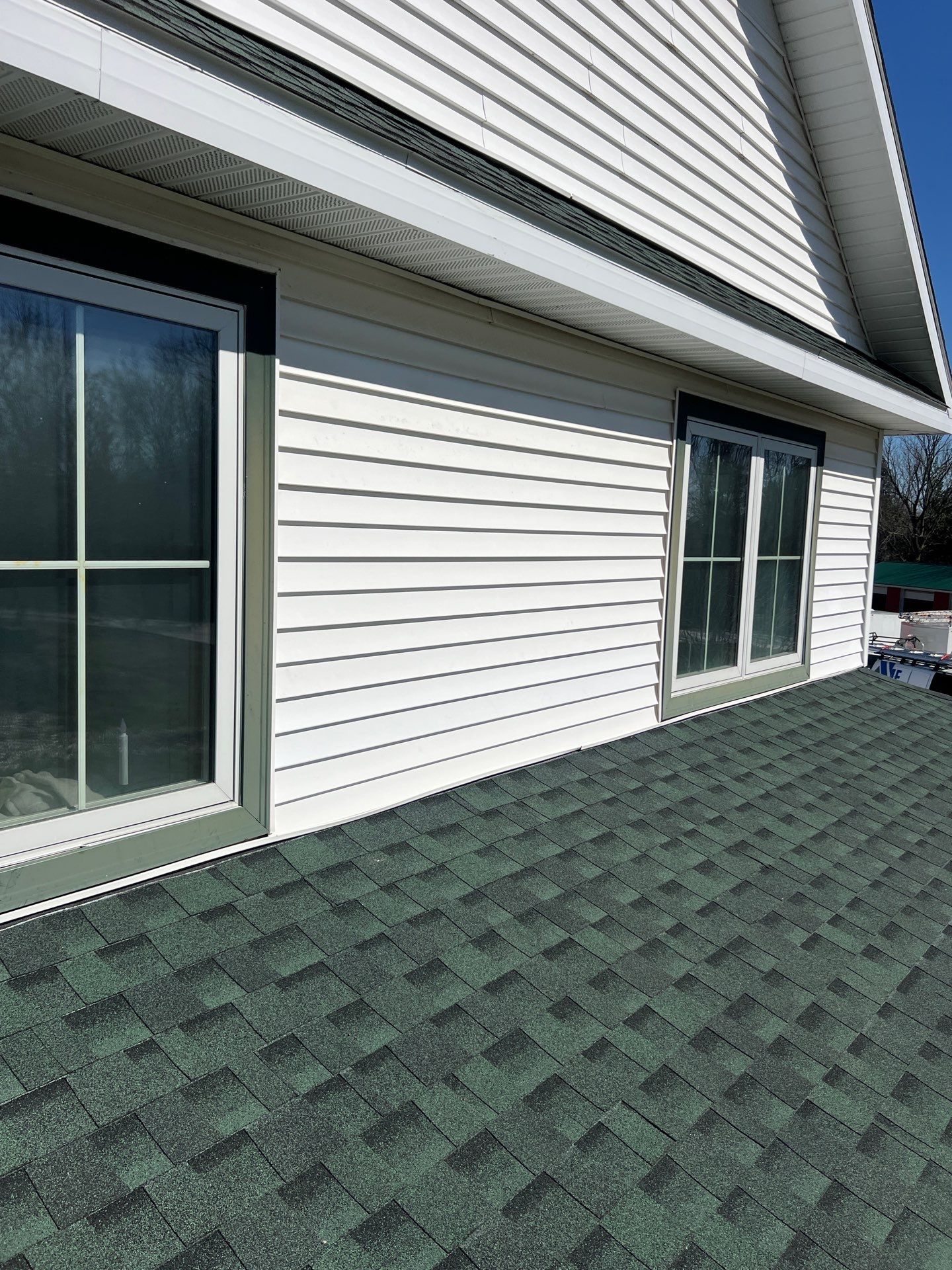 Residential Roofing Replacement with Multiple Skylights in Mason, Michigan by Acme Exteriors