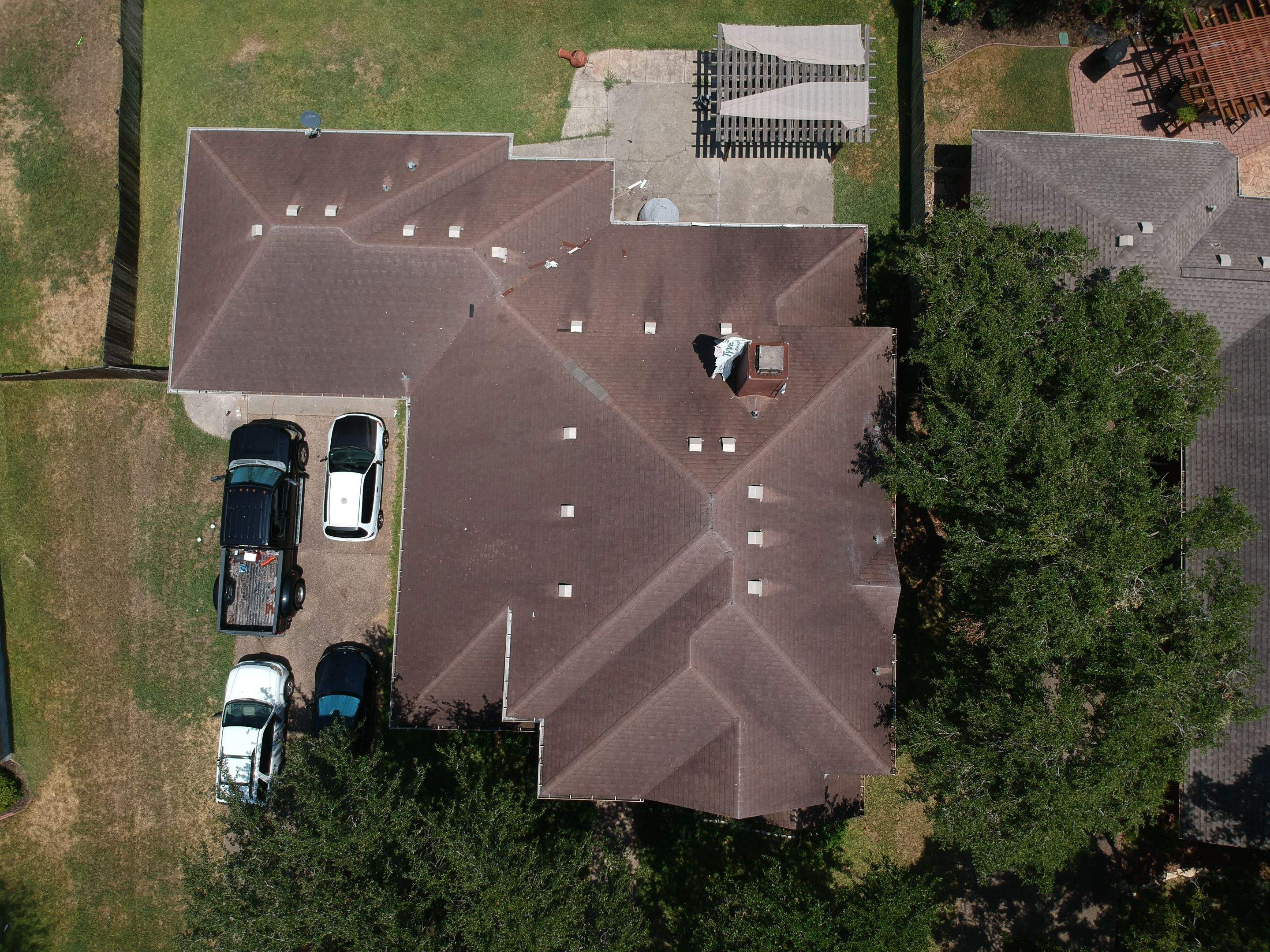 Residential Roofing Installation using Certainteed Landmark Moire Black by Galvan Roofing and Construction