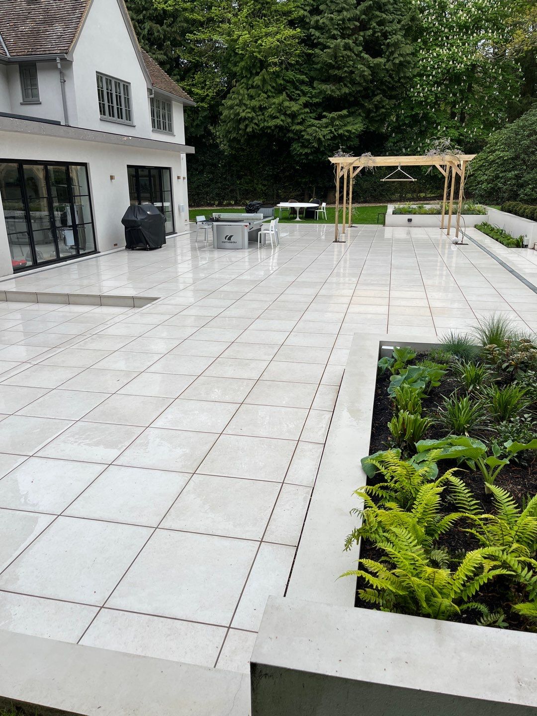 Porcelain Patio Clean using Honda 15lpm Low Pressure Washing Machine by Ges Exterior Cleaning ltd
