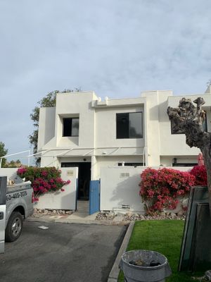 Window Installation using AMSCO Black Vinyl Windows